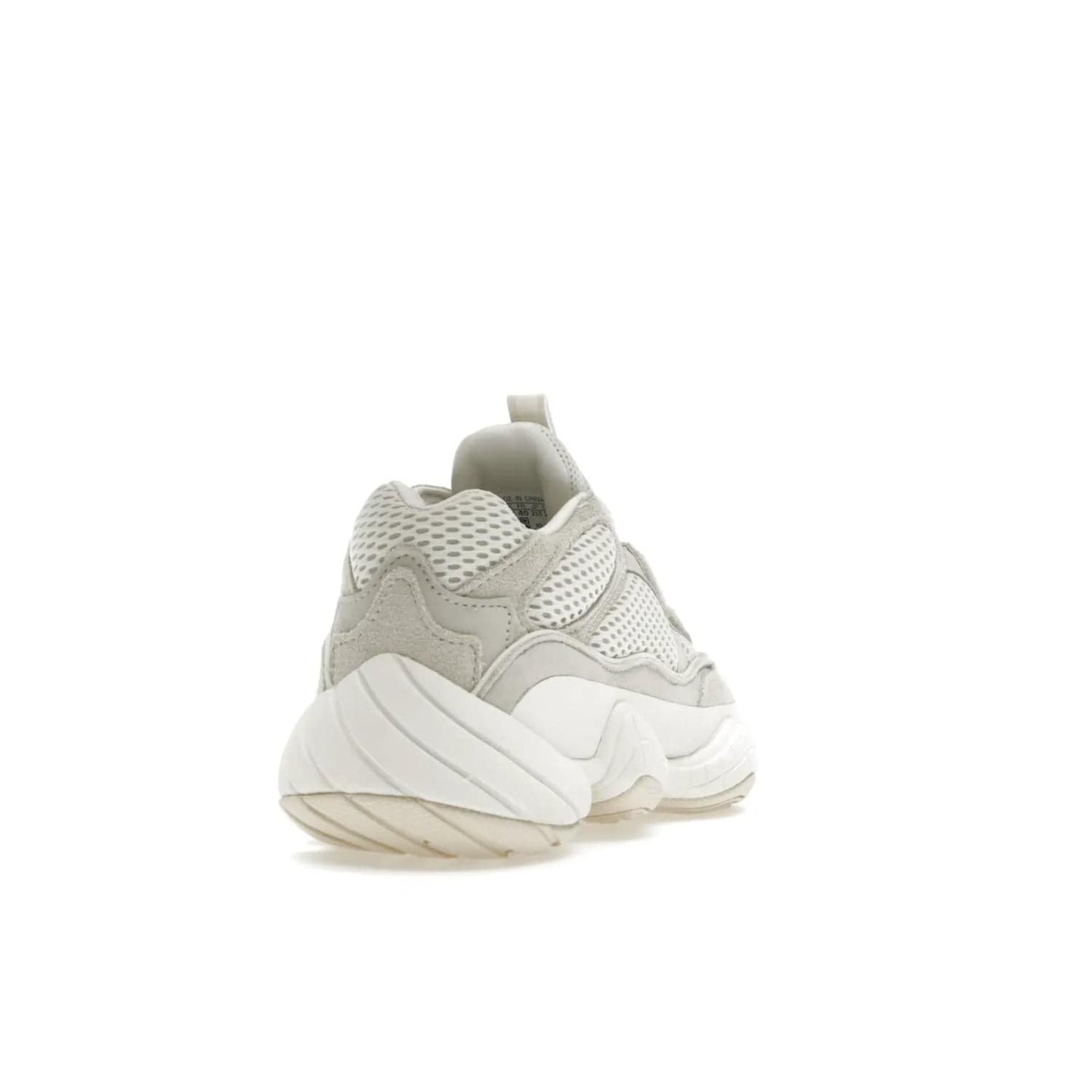 adidas Yeezy 500 Bone White (2023) - Image 30 - Only at www.BallersClubKickz.com - Experience the unique style of the adidas Yeezy 500 Bone White. Featuring a Bone White colorway and white accents, durable construction and comfortably light feel. Get ready to make a statement in 2023.