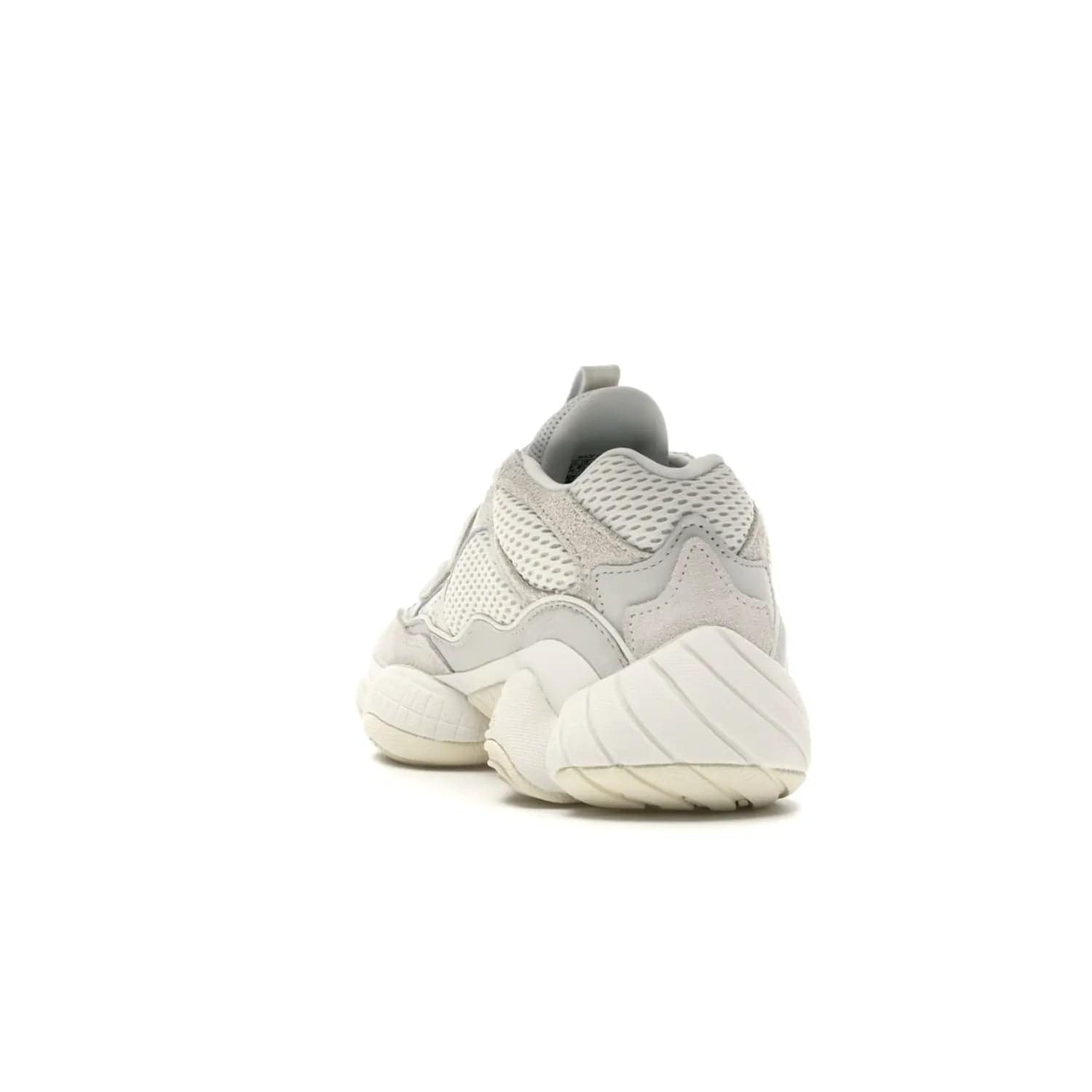 adidas Yeezy 500 Bone White - Image 26 - Only at www.BallersClubKickz.com - Classic look perfect for any sneaker collection. The adidas Yeezy 500 "Bone White" blends a white mesh upper with suede overlays & a chunky midsole inspired by the Adidas KB3. Complimented by a tonal-cream outsole, this timeless style is a must-have.
