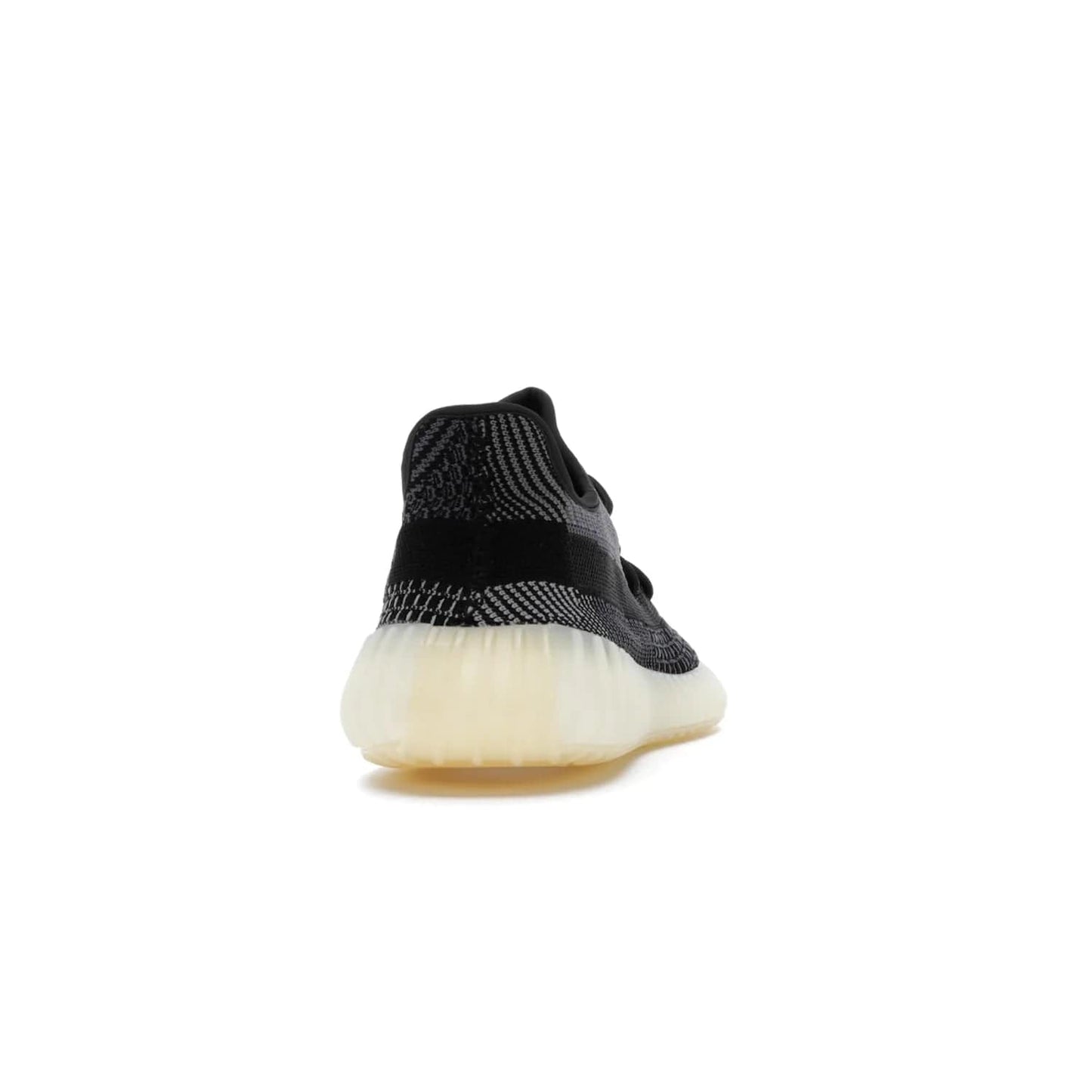 adidas Yeezy Boost 350 V2 Carbon - Image 29 - Only at www.BallersClubKickz.com - Introducing the adidas Yeezy Boost 350 V2 Carbon. Iconic sneaker with a dark-hued upper, breathable Primeknit mesh, signature side stripe, off-white midsole & BOOST cushioning. Perfect for any sneaker lover. Released October 2020.