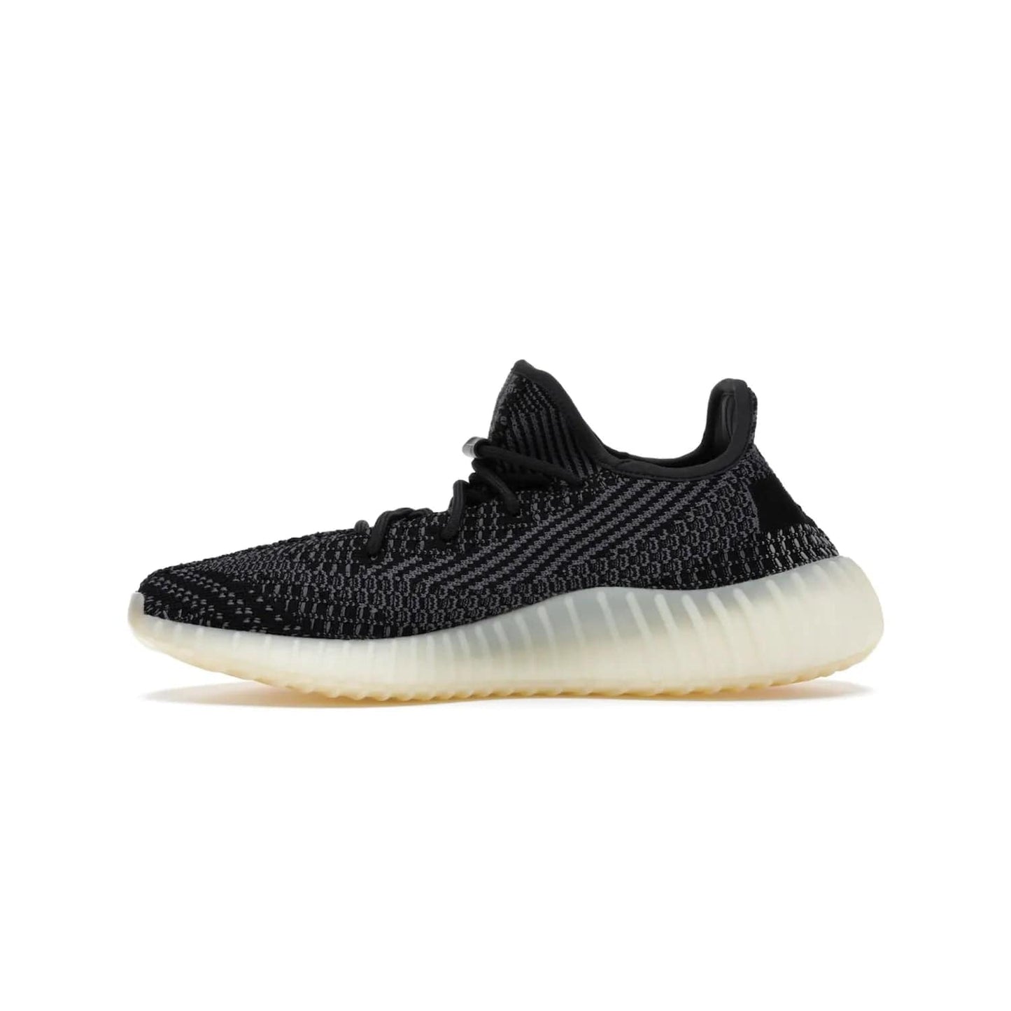 adidas Yeezy Boost 350 V2 Carbon - Image 19 - Only at www.BallersClubKickz.com - Introducing the adidas Yeezy Boost 350 V2 Carbon. Iconic sneaker with a dark-hued upper, breathable Primeknit mesh, signature side stripe, off-white midsole & BOOST cushioning. Perfect for any sneaker lover. Released October 2020.