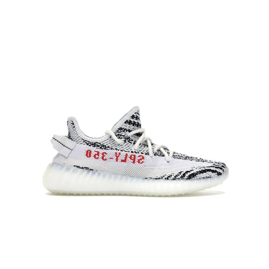 adidas Yeezy Boost 350 V2 Zebra - Image 1 - Only at www.BallersClubKickz.com - #
Score the iconic adidas Yeezy Boost 350 V2 Zebra for a fashionable addition to your street-style. Featuring a Primeknit upper and Boost sole, you'll look great and feel comfortable with every step.