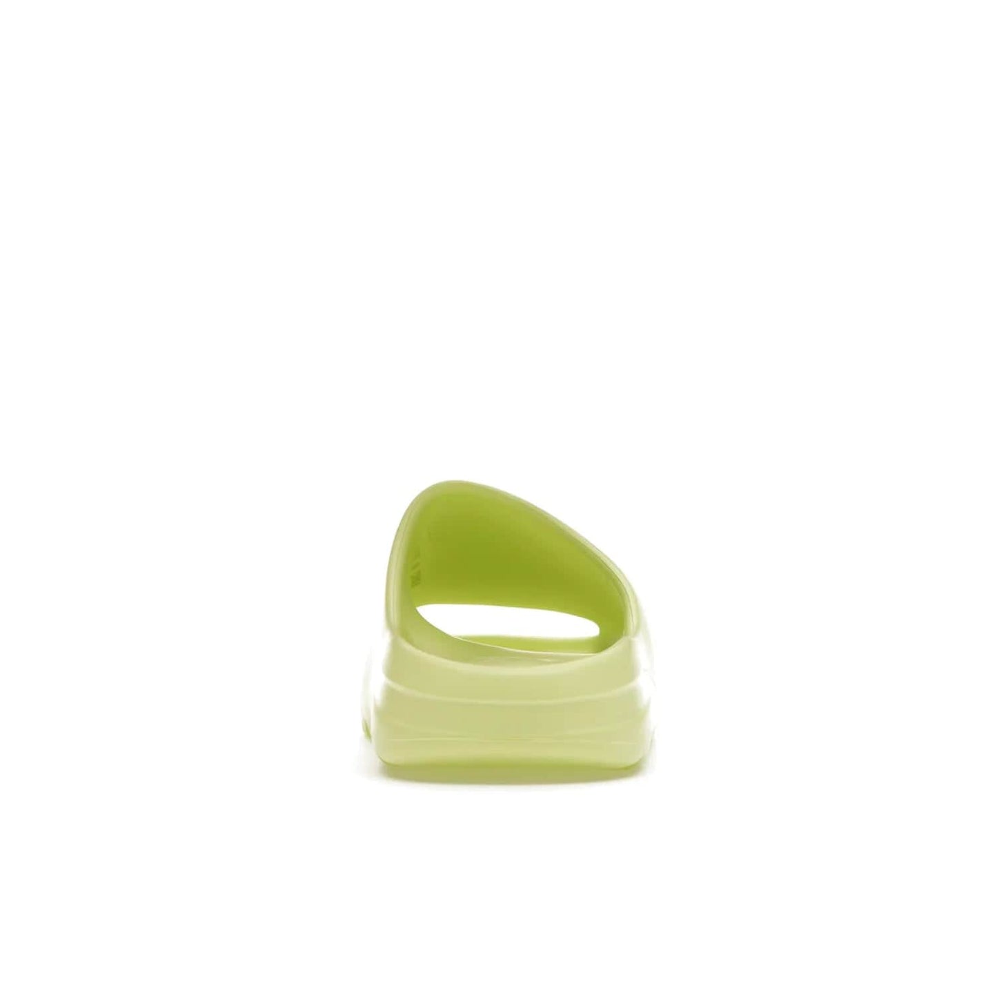 adidas Yeezy Slide Glow Green - Image 28 - Only at www.BallersClubKickz.com - Experience an unexpected summer style with the adidas Yeezy Slide Glow Green. This limited edition slide sandal provides a lightweight and durable construction and a bold Glow Green hue. Strategic grooves enhance traction and provide all-day comfort. Make a statement with the adidas Yeezy Slide Glow Green.