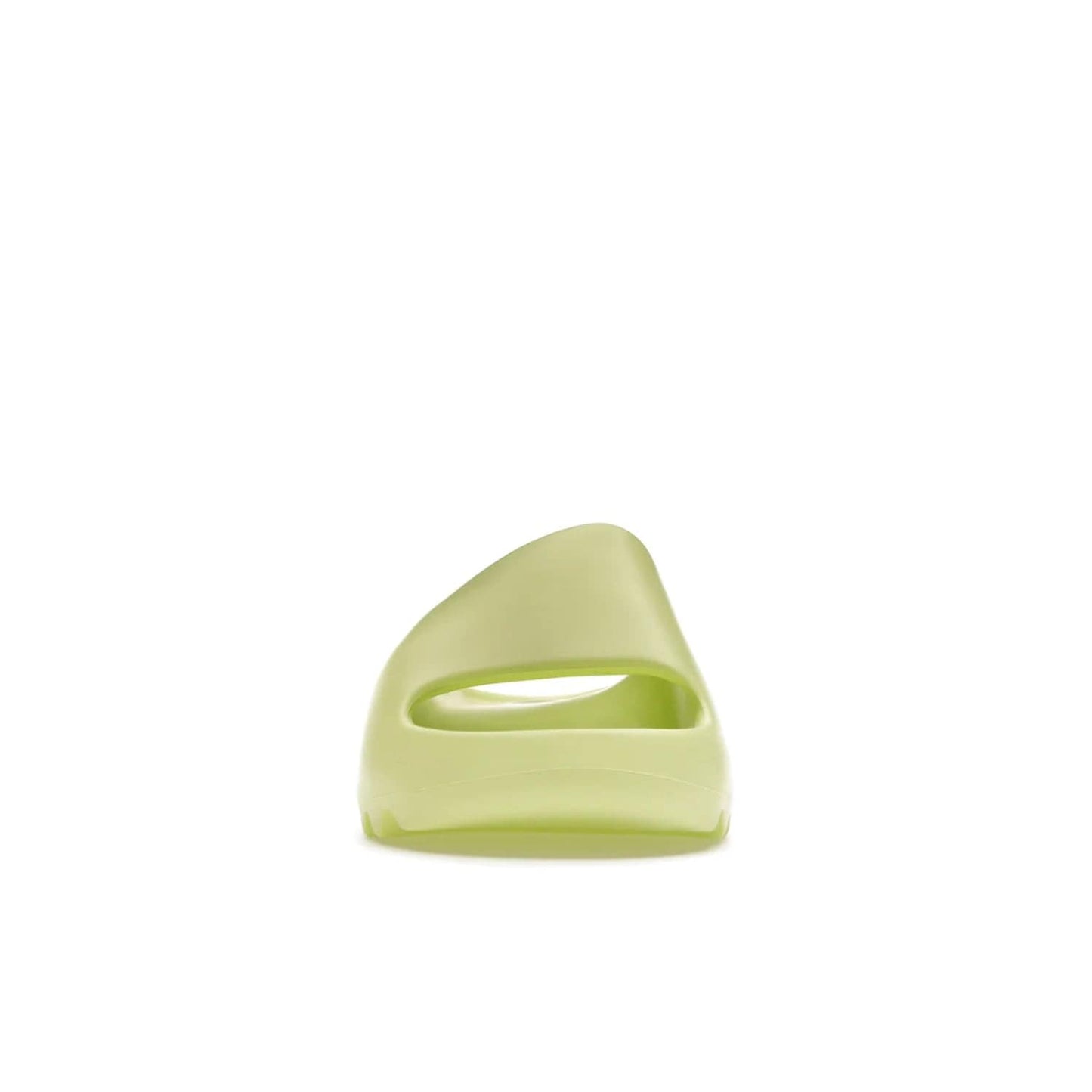adidas Yeezy Slide Glow Green - Image 10 - Only at www.BallersClubKickz.com - Experience an unexpected summer style with the adidas Yeezy Slide Glow Green. This limited edition slide sandal provides a lightweight and durable construction and a bold Glow Green hue. Strategic grooves enhance traction and provide all-day comfort. Make a statement with the adidas Yeezy Slide Glow Green.