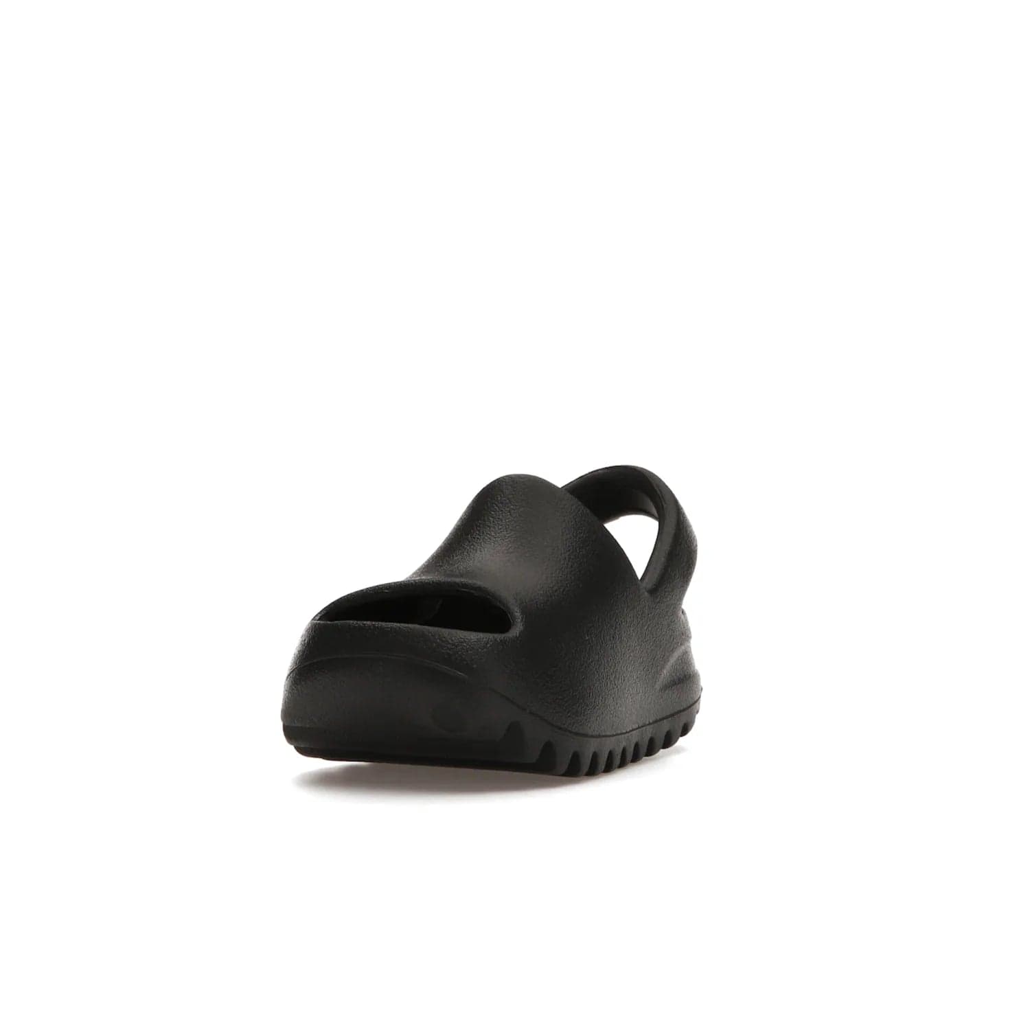 adidas Yeezy Slide Onyx (Infants) - Image 13 - Only at www.BallersClubKickz.com - The Adidas Yeezy Slide Onyx (Infant) is a classic silhouette with unique features and durable EVA foam. Released in May 2021 with a starting price of $70, it's no wonder it quickly gained popularity with its cool, minimalist look.
