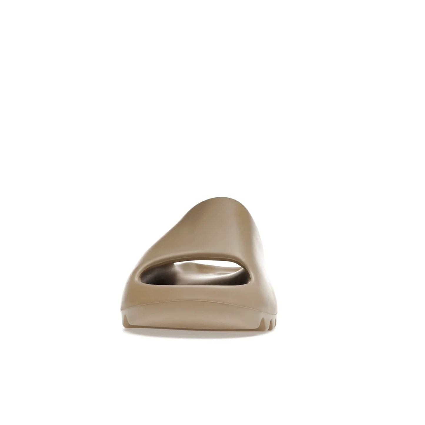 adidas Yeezy Slide Pure (First Release) - Image 11 - Only at www.BallersClubKickz.com - Shop the new adidas Yeezy Slide Pure at adidas. Crafted with a Pure EVA foam upper and soft footbed for instant comfort. Outsole with grooves offers traction & support for a perfect summer look. Available in Pure/Pure/Pure.