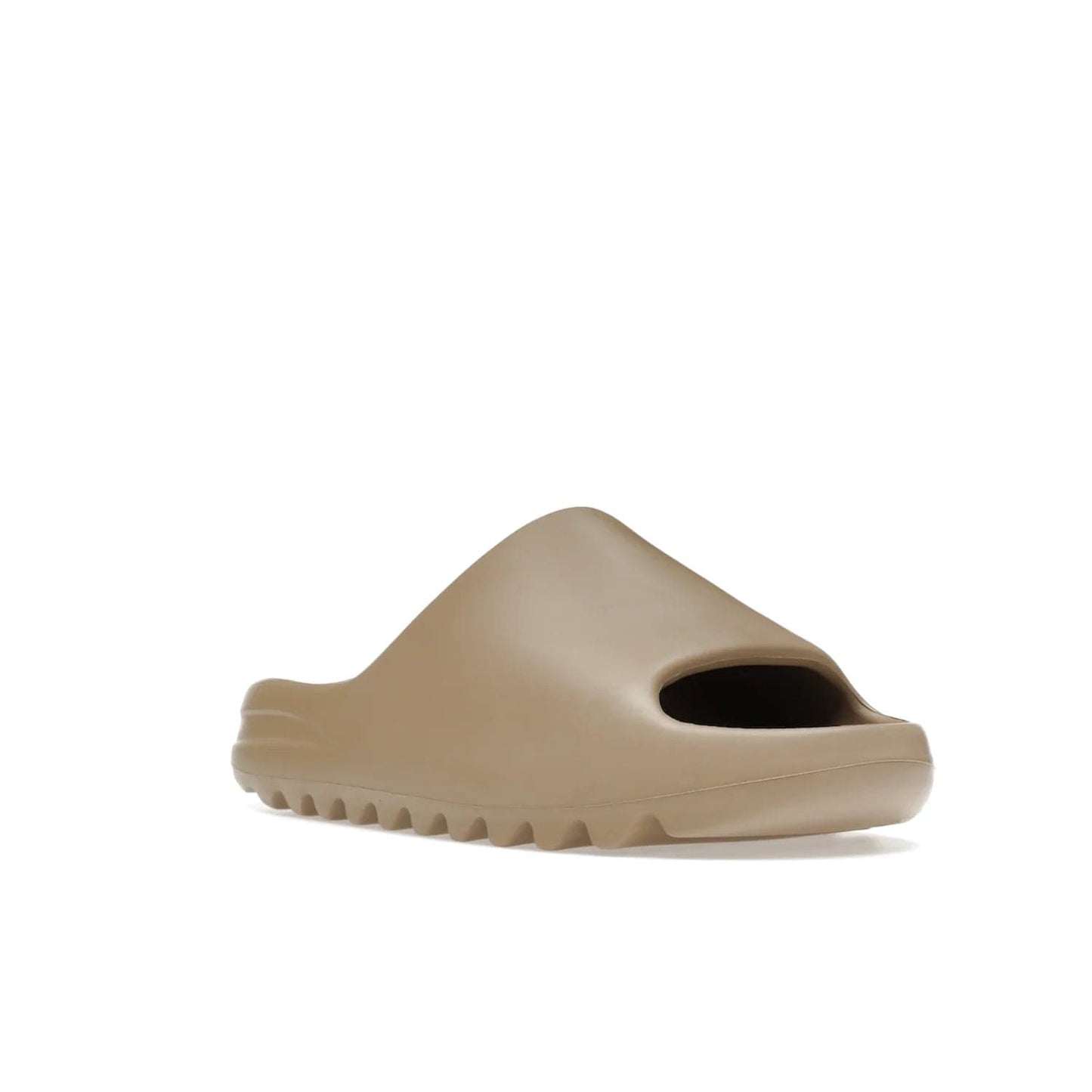 adidas Yeezy Slide Pure (First Release) - Image 6 - Only at www.BallersClubKickz.com - Shop the new adidas Yeezy Slide Pure at adidas. Crafted with a Pure EVA foam upper and soft footbed for instant comfort. Outsole with grooves offers traction & support for a perfect summer look. Available in Pure/Pure/Pure.