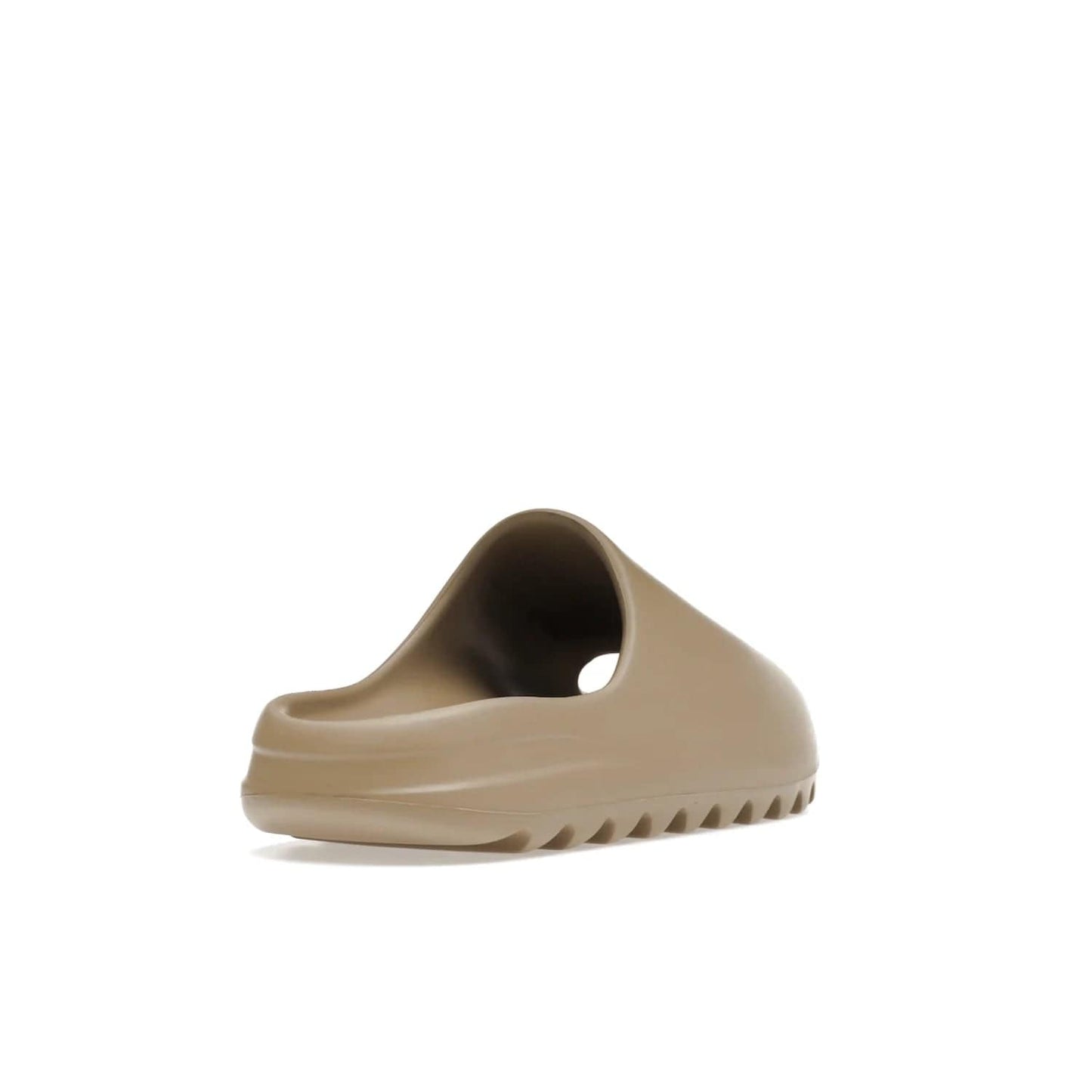 adidas Yeezy Slide Pure (First Release) - Image 31 - Only at www.BallersClubKickz.com - Shop the new adidas Yeezy Slide Pure at adidas. Crafted with a Pure EVA foam upper and soft footbed for instant comfort. Outsole with grooves offers traction & support for a perfect summer look. Available in Pure/Pure/Pure.
