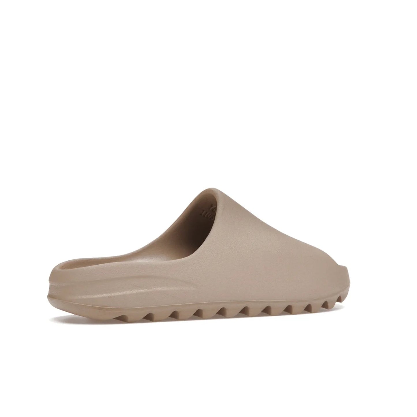 adidas Yeezy Slide Pure (Restock Pair) - Image 34 - Only at www.BallersClubKickz.com - Experience comfort and style with the adidas Yeezy Slide Pure (Restock Pair)! Featuring a pebbled composition and a grooved sole and cushioned footbed, this is the perfect shoe to pair with jeans or joggers. Get ready for the classic Pure/Pure/Pure colorway!