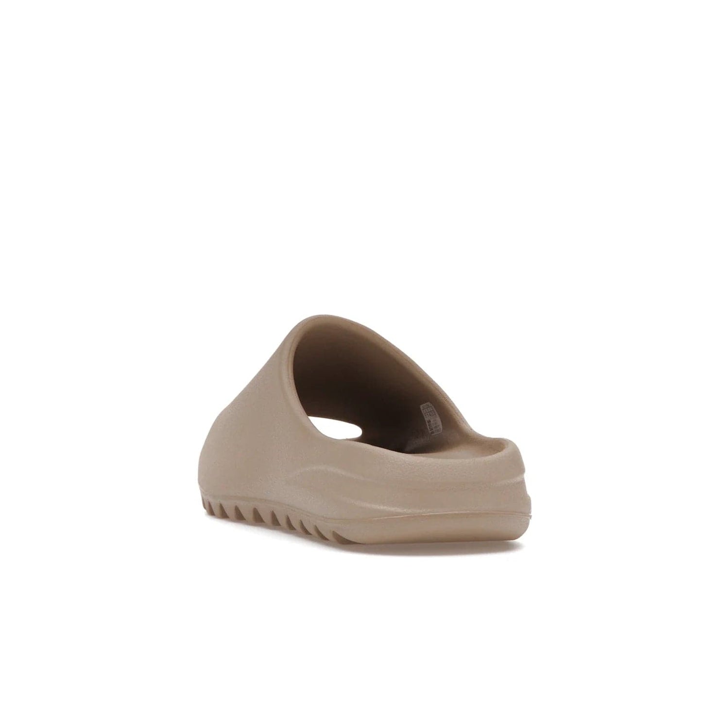 adidas Yeezy Slide Pure (Restock Pair) - Image 26 - Only at www.BallersClubKickz.com - Experience comfort and style with the adidas Yeezy Slide Pure (Restock Pair)! Featuring a pebbled composition and a grooved sole and cushioned footbed, this is the perfect shoe to pair with jeans or joggers. Get ready for the classic Pure/Pure/Pure colorway!