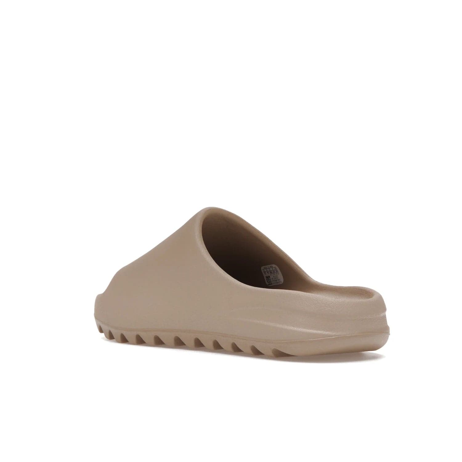 adidas Yeezy Slide Pure (Restock Pair) - Image 24 - Only at www.BallersClubKickz.com - Experience comfort and style with the adidas Yeezy Slide Pure (Restock Pair)! Featuring a pebbled composition and a grooved sole and cushioned footbed, this is the perfect shoe to pair with jeans or joggers. Get ready for the classic Pure/Pure/Pure colorway!