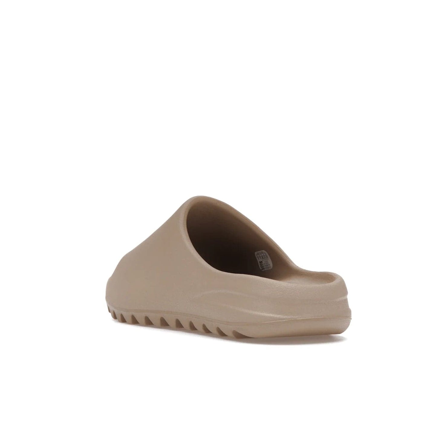 adidas Yeezy Slide Pure (Restock Pair) - Image 25 - Only at www.BallersClubKickz.com - Experience comfort and style with the adidas Yeezy Slide Pure (Restock Pair)! Featuring a pebbled composition and a grooved sole and cushioned footbed, this is the perfect shoe to pair with jeans or joggers. Get ready for the classic Pure/Pure/Pure colorway!