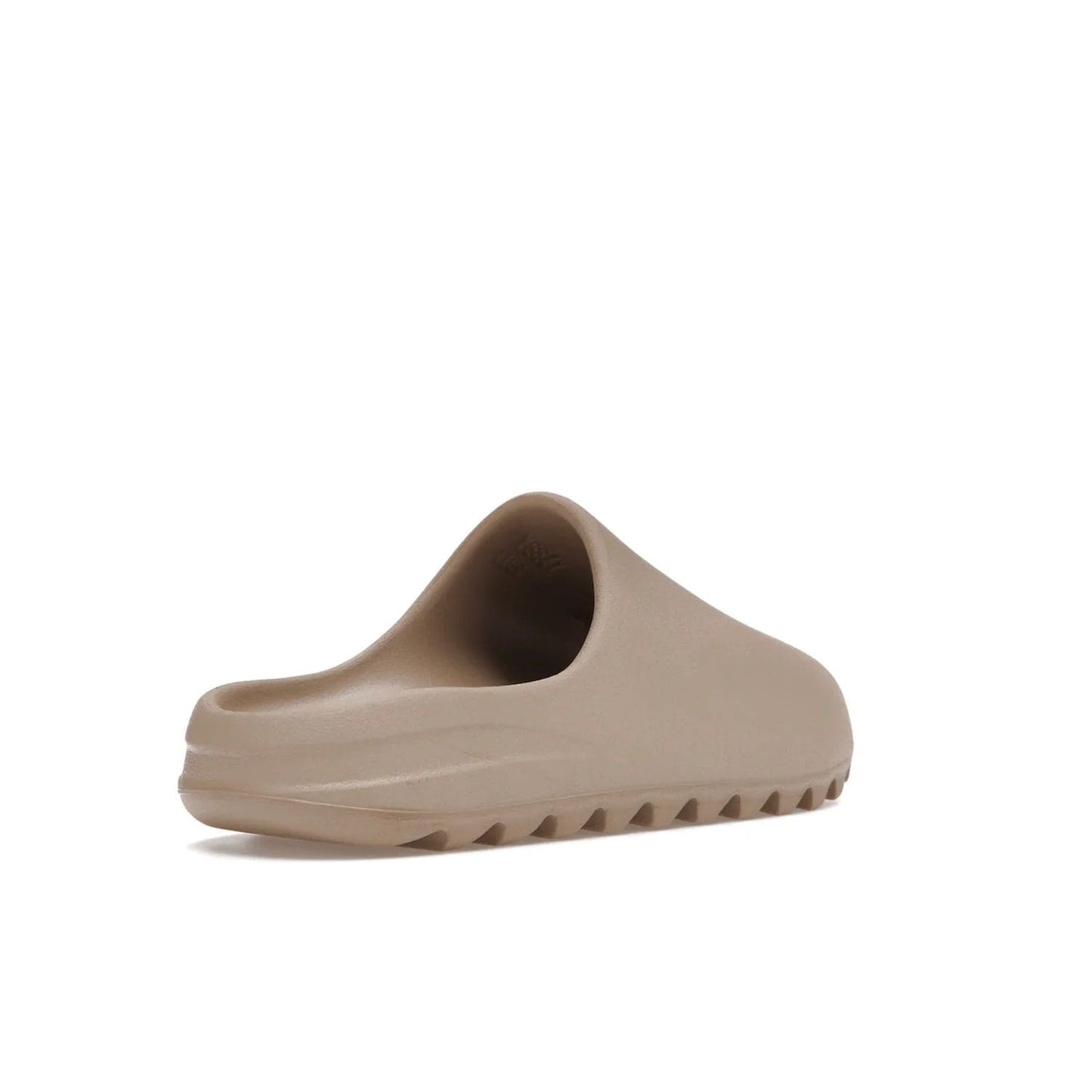 adidas Yeezy Slide Pure (Restock Pair) - Image 32 - Only at www.BallersClubKickz.com - Experience comfort and style with the adidas Yeezy Slide Pure (Restock Pair)! Featuring a pebbled composition and a grooved sole and cushioned footbed, this is the perfect shoe to pair with jeans or joggers. Get ready for the classic Pure/Pure/Pure colorway!