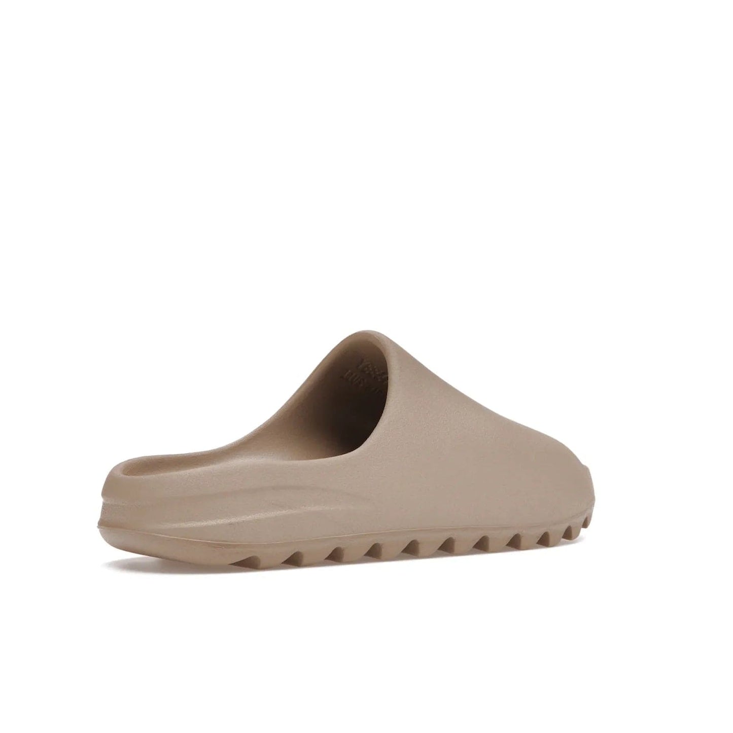 adidas Yeezy Slide Pure (Restock Pair) - Image 33 - Only at www.BallersClubKickz.com - Experience comfort and style with the adidas Yeezy Slide Pure (Restock Pair)! Featuring a pebbled composition and a grooved sole and cushioned footbed, this is the perfect shoe to pair with jeans or joggers. Get ready for the classic Pure/Pure/Pure colorway!