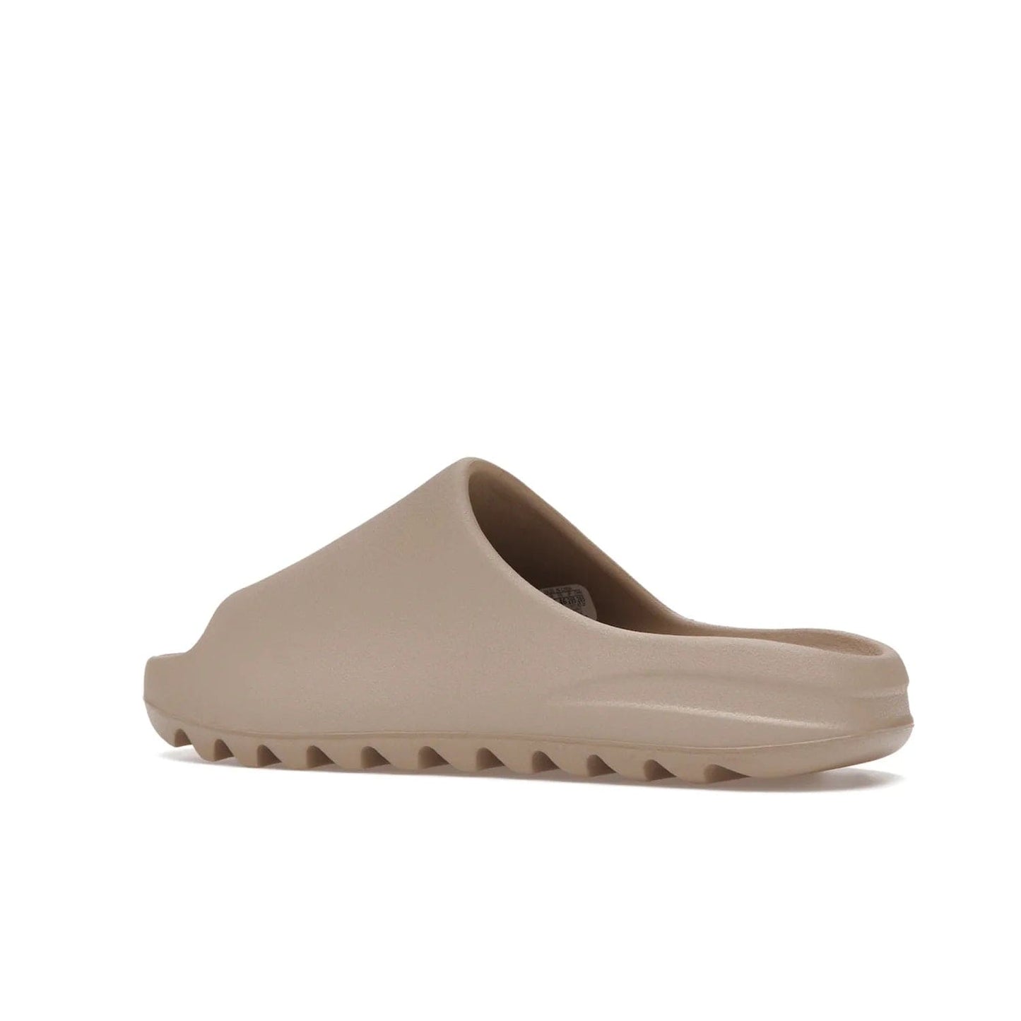 adidas Yeezy Slide Pure (Restock Pair) - Image 22 - Only at www.BallersClubKickz.com - Experience comfort and style with the adidas Yeezy Slide Pure (Restock Pair)! Featuring a pebbled composition and a grooved sole and cushioned footbed, this is the perfect shoe to pair with jeans or joggers. Get ready for the classic Pure/Pure/Pure colorway!