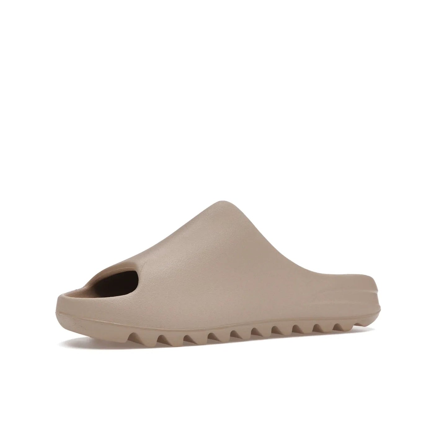 adidas Yeezy Slide Pure (Restock Pair) - Image 16 - Only at www.BallersClubKickz.com - Experience comfort and style with the adidas Yeezy Slide Pure (Restock Pair)! Featuring a pebbled composition and a grooved sole and cushioned footbed, this is the perfect shoe to pair with jeans or joggers. Get ready for the classic Pure/Pure/Pure colorway!