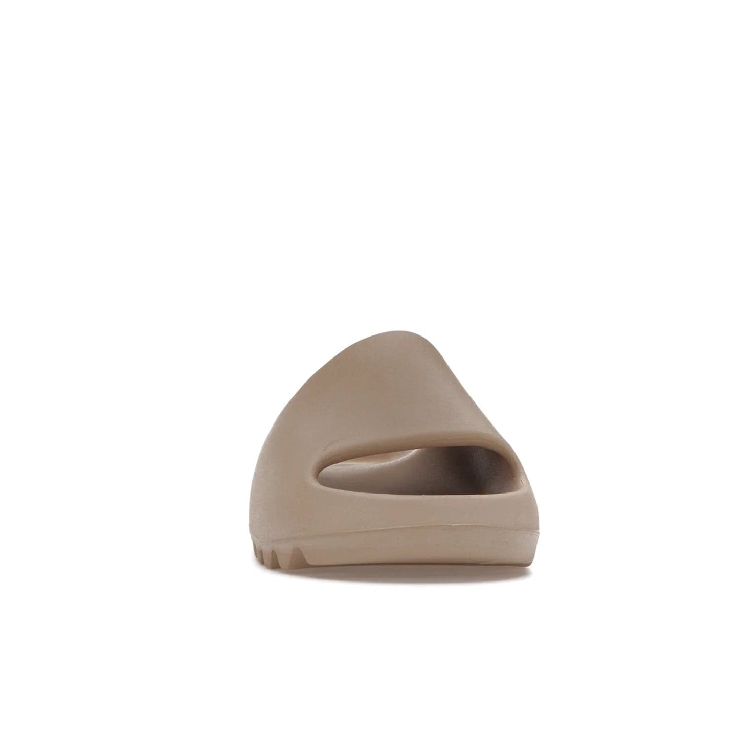 adidas Yeezy Slide Pure (Restock Pair) - Image 9 - Only at www.BallersClubKickz.com - Experience comfort and style with the adidas Yeezy Slide Pure (Restock Pair)! Featuring a pebbled composition and a grooved sole and cushioned footbed, this is the perfect shoe to pair with jeans or joggers. Get ready for the classic Pure/Pure/Pure colorway!