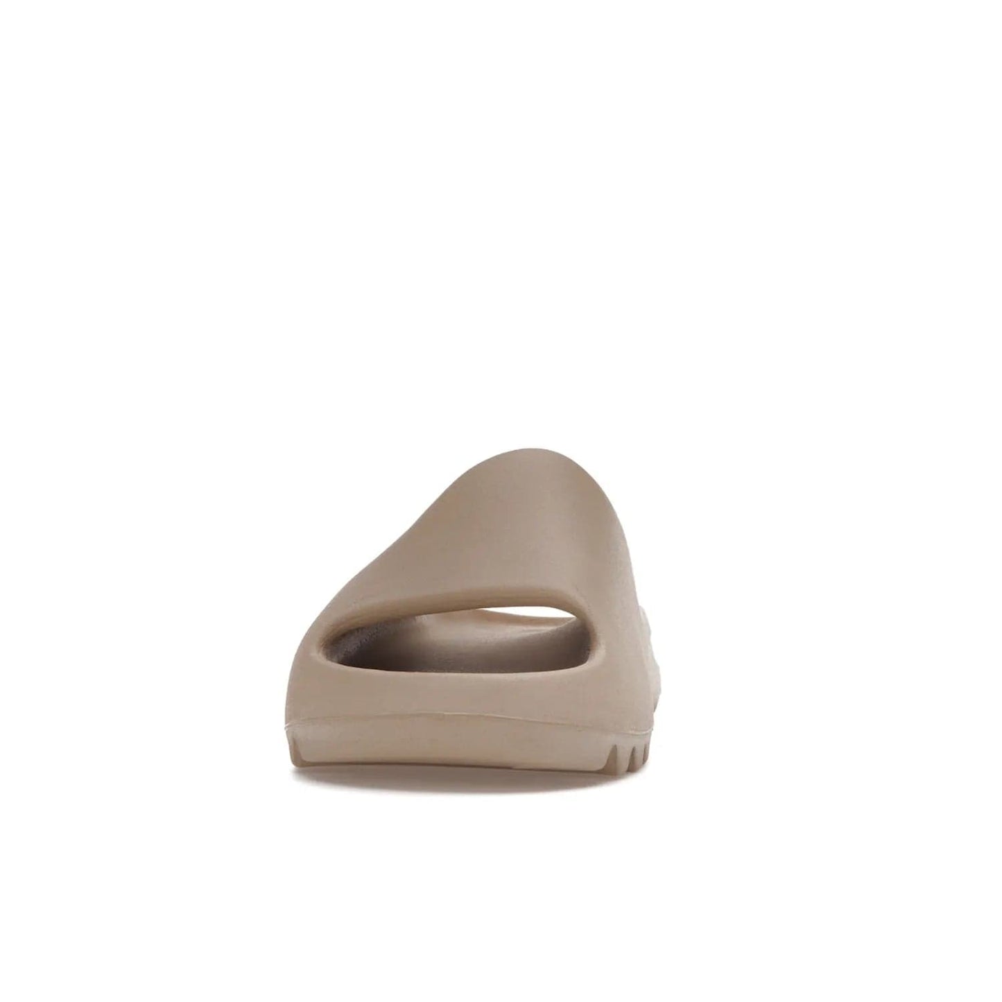 adidas Yeezy Slide Pure (Restock Pair) - Image 11 - Only at www.BallersClubKickz.com - Experience comfort and style with the adidas Yeezy Slide Pure (Restock Pair)! Featuring a pebbled composition and a grooved sole and cushioned footbed, this is the perfect shoe to pair with jeans or joggers. Get ready for the classic Pure/Pure/Pure colorway!