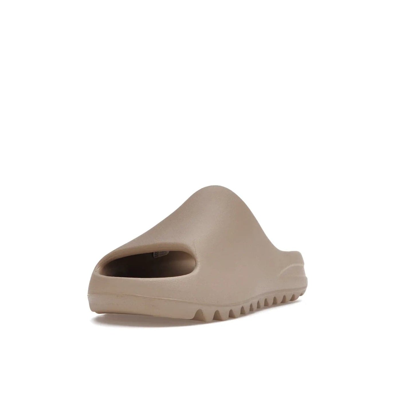 adidas Yeezy Slide Pure (Restock Pair) - Image 13 - Only at www.BallersClubKickz.com - Experience comfort and style with the adidas Yeezy Slide Pure (Restock Pair)! Featuring a pebbled composition and a grooved sole and cushioned footbed, this is the perfect shoe to pair with jeans or joggers. Get ready for the classic Pure/Pure/Pure colorway!