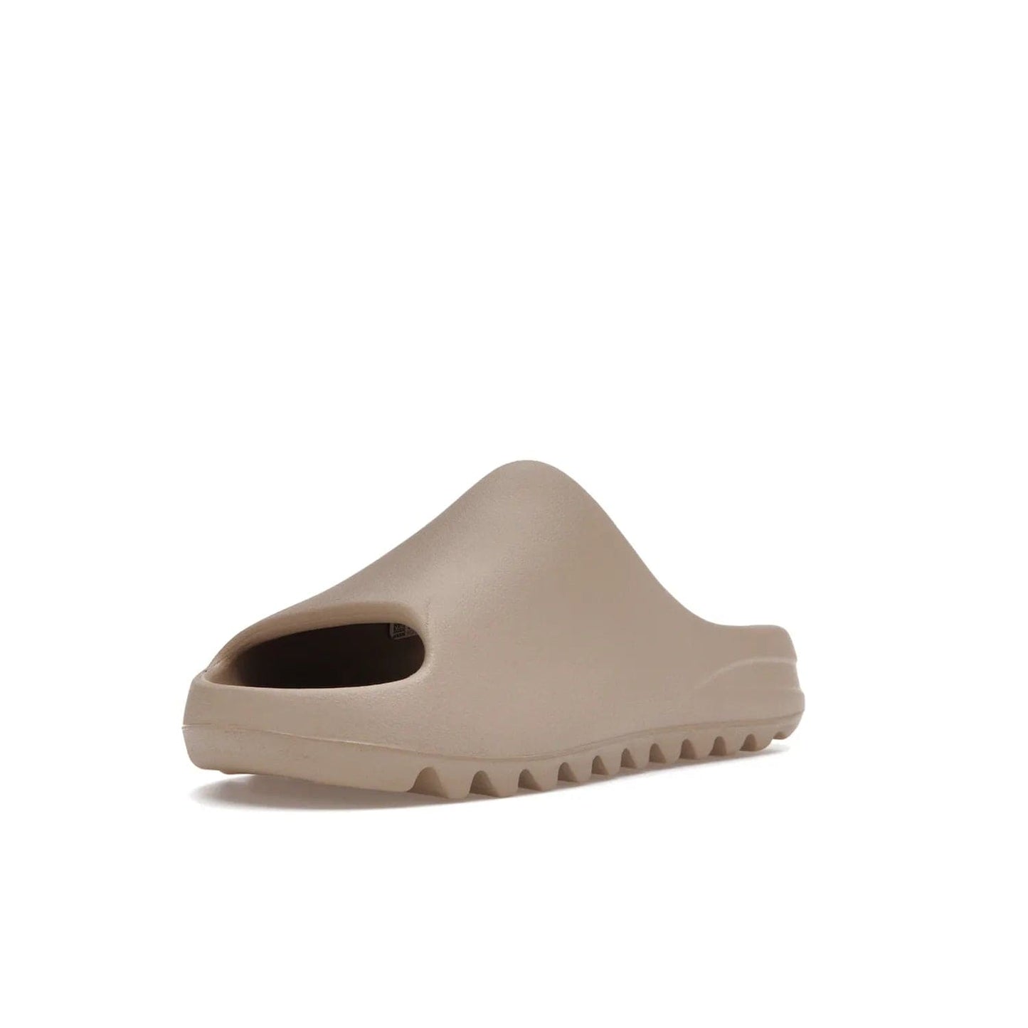 adidas Yeezy Slide Pure (Restock Pair) - Image 14 - Only at www.BallersClubKickz.com - Experience comfort and style with the adidas Yeezy Slide Pure (Restock Pair)! Featuring a pebbled composition and a grooved sole and cushioned footbed, this is the perfect shoe to pair with jeans or joggers. Get ready for the classic Pure/Pure/Pure colorway!