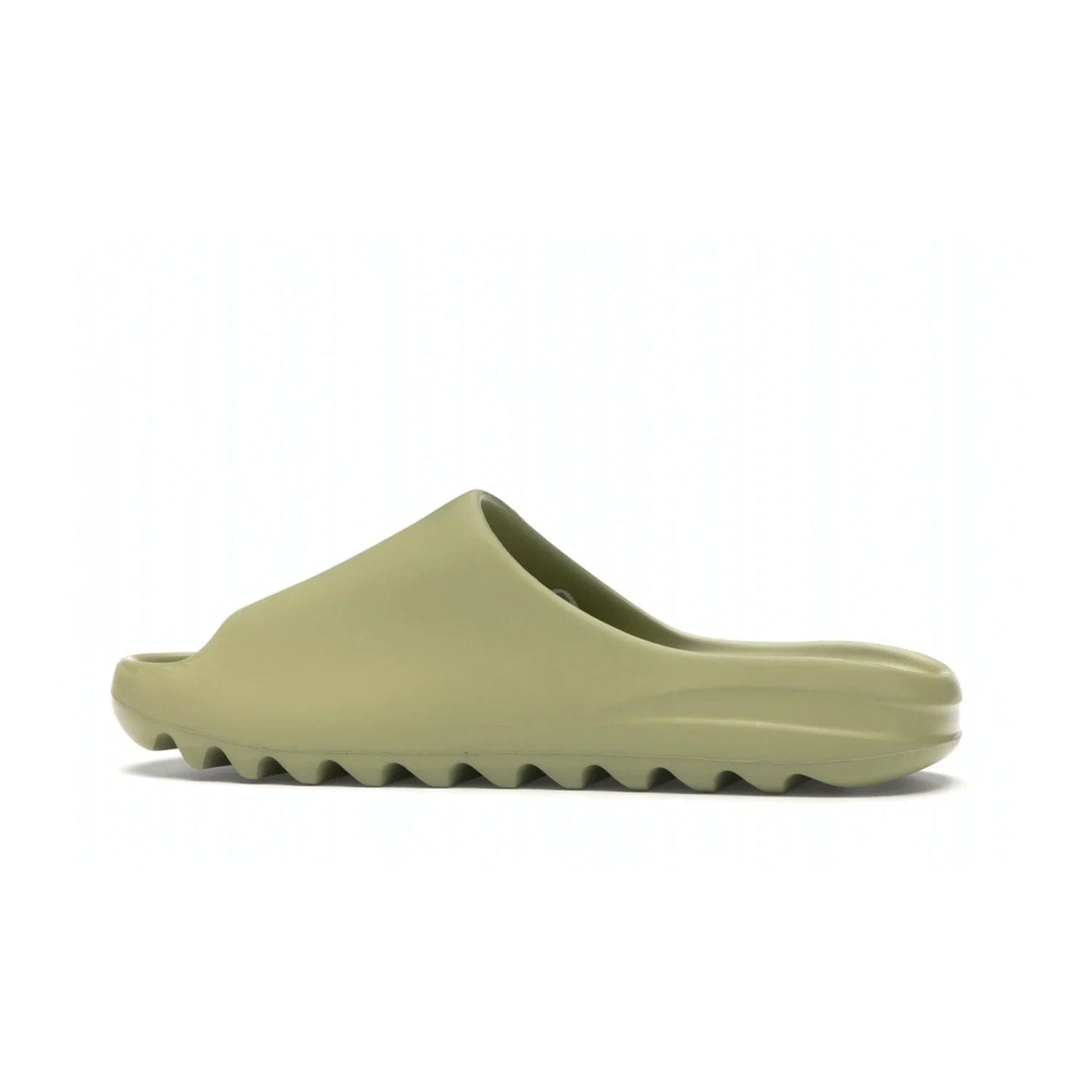 adidas Yeezy Slide Resin (2019/2021) - Image 21 - Only at www.BallersClubKickz.com - Step into fashion and function with the adidas Yeezy Slide Resin. Featuring a lightweight Resin EVA foam construction and an outsole with accentuated grooves for traction and support. The latest release is available in a Resin/Resin/Resin colorway, combining modern aesthetics and classic style. Step into style with the adidas Yeezy Slide Resin and be the trend-setter this season.