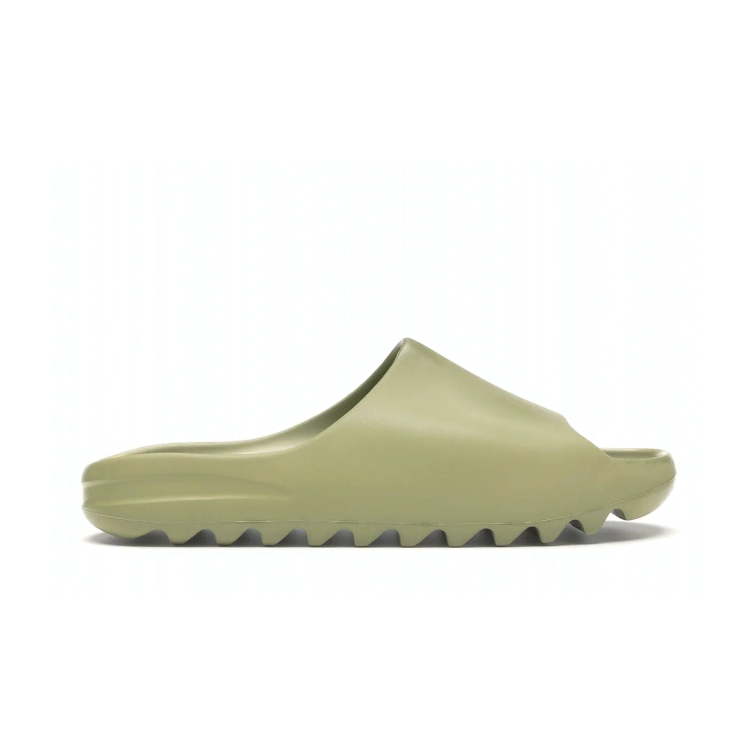 adidas Yeezy Slide Resin (2019/2021) - Image 1 - Only at www.BallersClubKickz.com - Step into fashion and function with the adidas Yeezy Slide Resin. Featuring a lightweight Resin EVA foam construction and an outsole with accentuated grooves for traction and support. The latest release is available in a Resin/Resin/Resin colorway, combining modern aesthetics and classic style. Step into style with the adidas Yeezy Slide Resin and be the trend-setter this season.