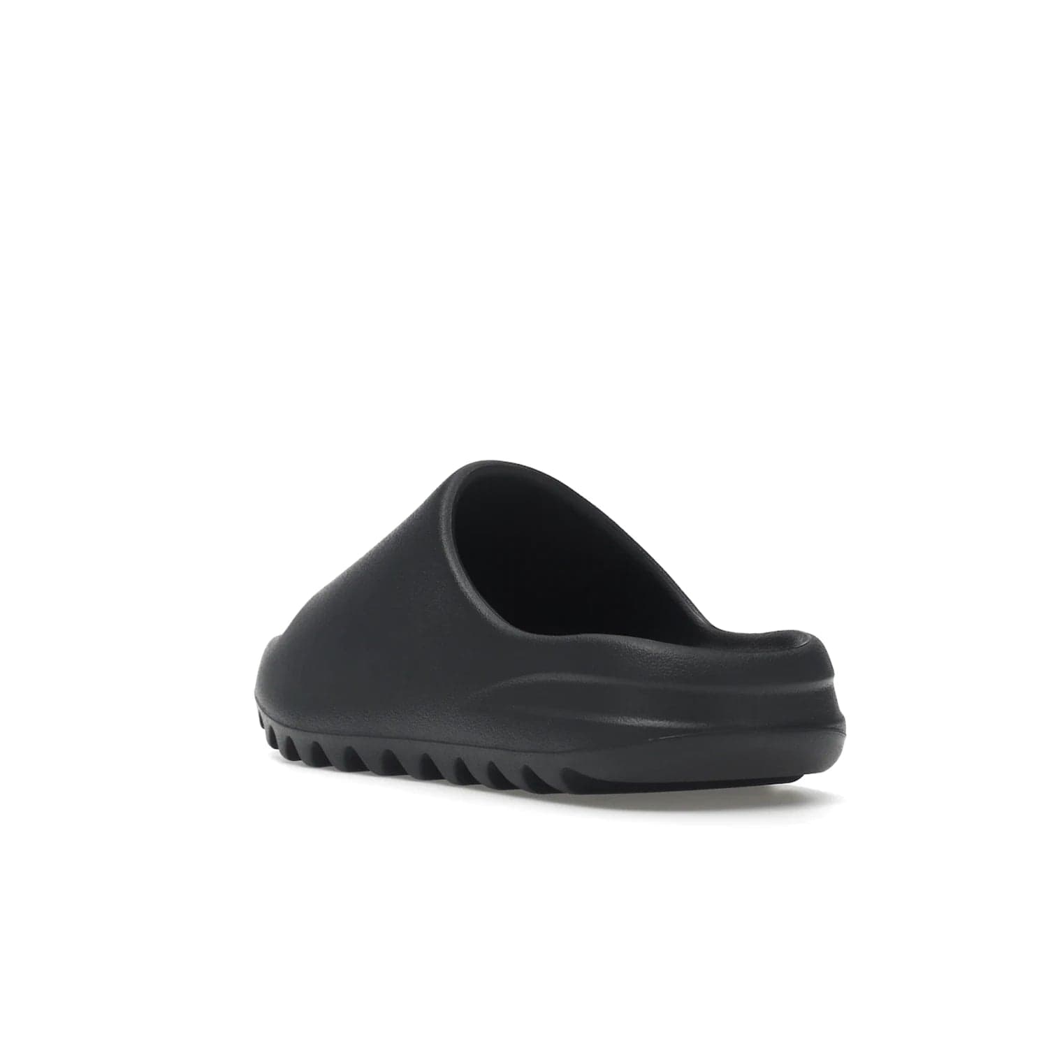 adidas Yeezy Slide Slate Grey - Image 25 - Only at www.BallersClubKickz.com - Stylish & comfortable adidas Yeezy Slide Slate Grey features an EVA foam upper, strategic cutouts, textured outsole pattern, & easy slip-on design for modern comfort & classic style.