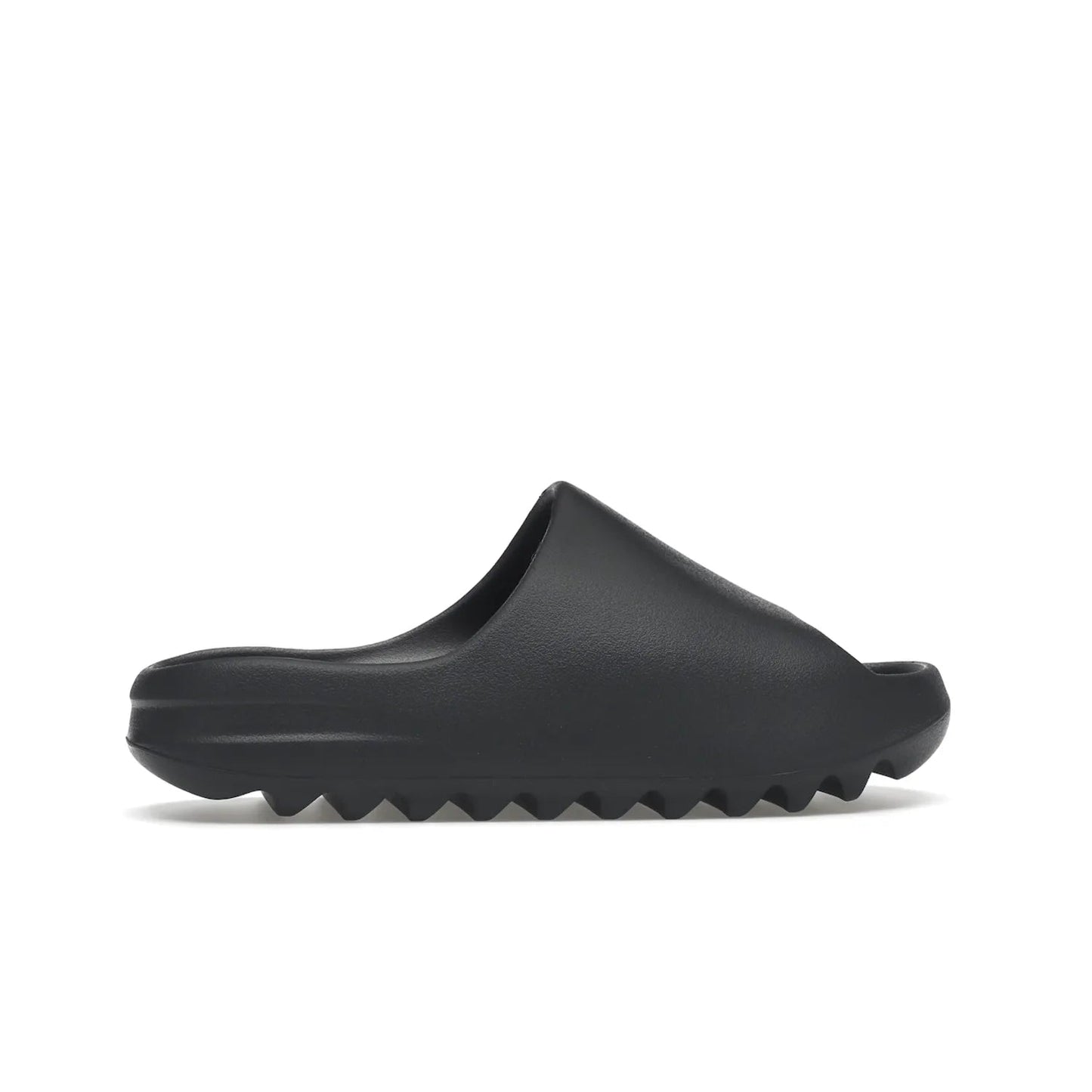 adidas Yeezy Slide Slate Grey - Image 36 - Only at www.BallersClubKickz.com - Stylish & comfortable adidas Yeezy Slide Slate Grey features an EVA foam upper, strategic cutouts, textured outsole pattern, & easy slip-on design for modern comfort & classic style.