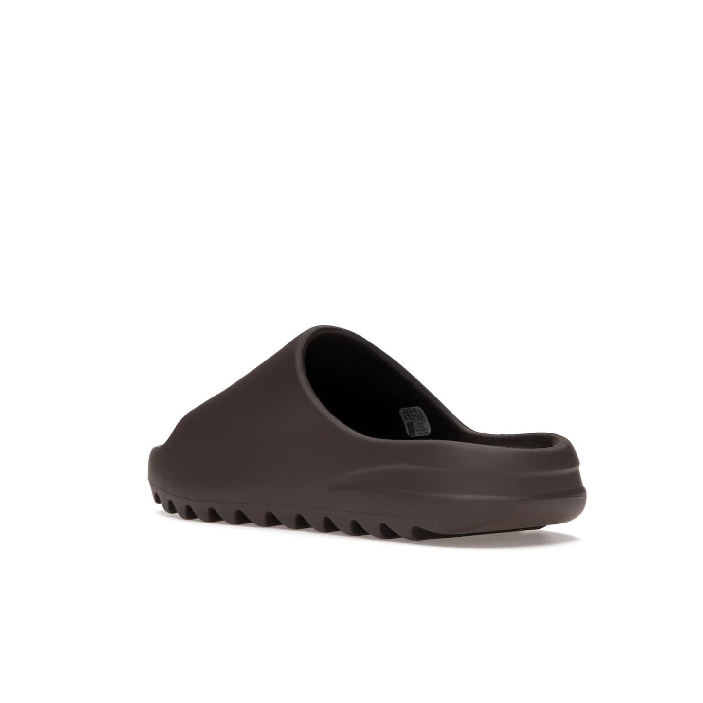 adidas Yeezy Slide Soot - Image 24 - Only at www.BallersClubKickz.com - Shop the Yeezy Slide Soot sneaker by Adidas, a sleek blend of form and function. Monochrome silhouette in Soot/Soot/Soot. Lightweight EVA foam offers comfort and durability. Get the must-have style today.