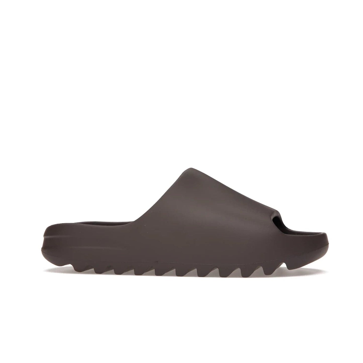 adidas Yeezy Slide Soot - Image 2 - Only at www.BallersClubKickz.com - Shop the Yeezy Slide Soot sneaker by Adidas, a sleek blend of form and function. Monochrome silhouette in Soot/Soot/Soot. Lightweight EVA foam offers comfort and durability. Get the must-have style today.