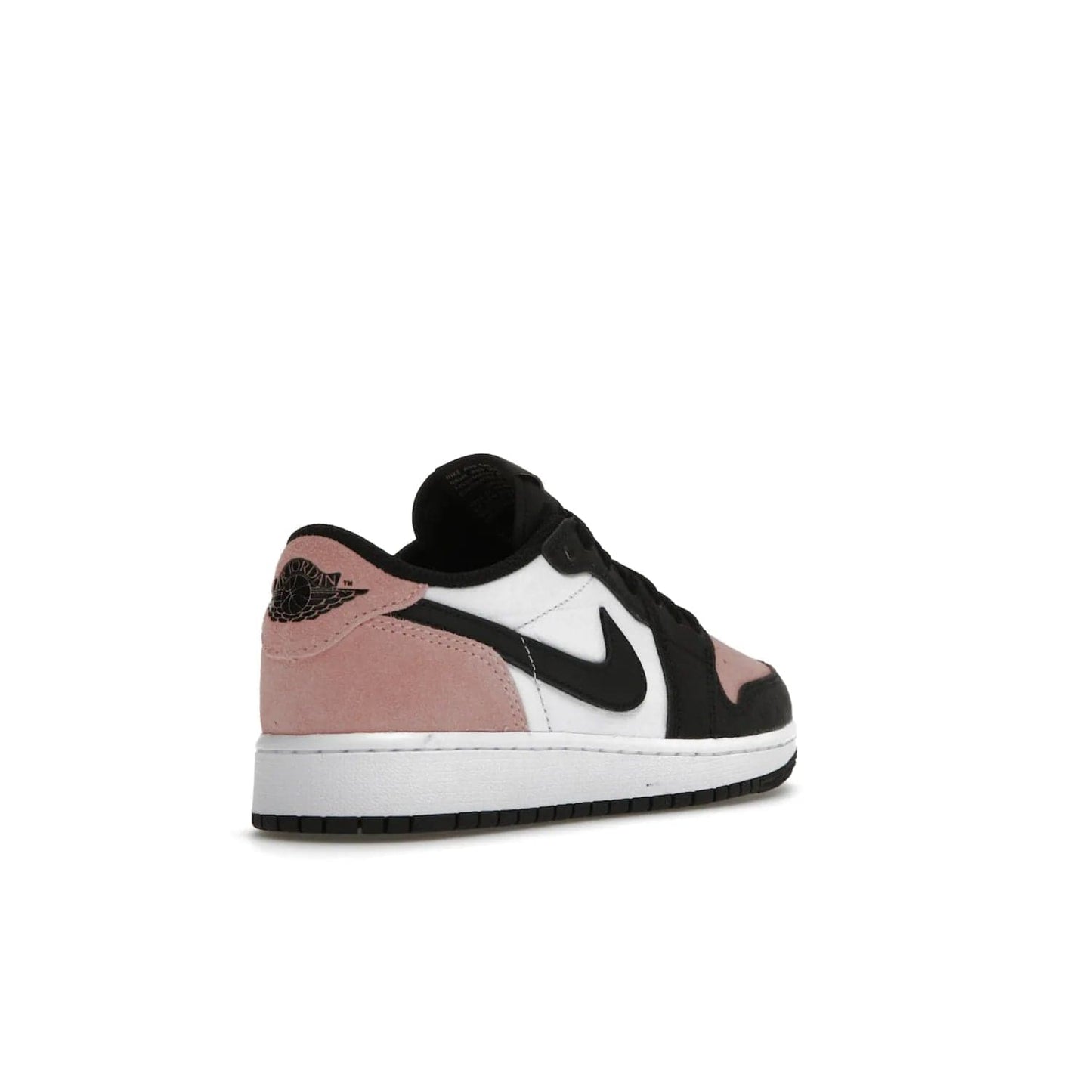 Jordan 1 Low OG Bleached Coral (GS) - Image 32 - Only at www.BallersClubKickz.com - Look cool and classic in the Air Jordan 1 Low OG Bleached Coral (Gradeschool). White leather upper with bleached coral accents, black toe and Swooshes, and perforated toe box for breathability. Style with jeans or shorts for an effortless look. Released July 2022.