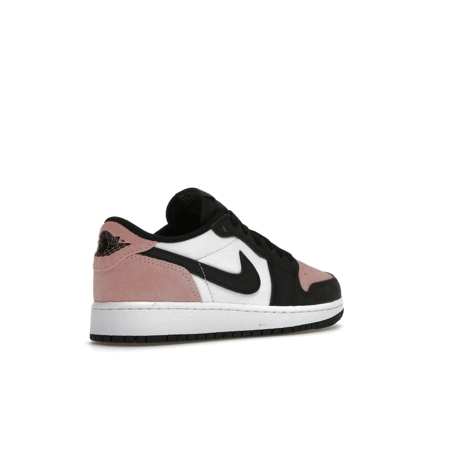 Jordan 1 Low OG Bleached Coral (GS) - Image 33 - Only at www.BallersClubKickz.com - Look cool and classic in the Air Jordan 1 Low OG Bleached Coral (Gradeschool). White leather upper with bleached coral accents, black toe and Swooshes, and perforated toe box for breathability. Style with jeans or shorts for an effortless look. Released July 2022.