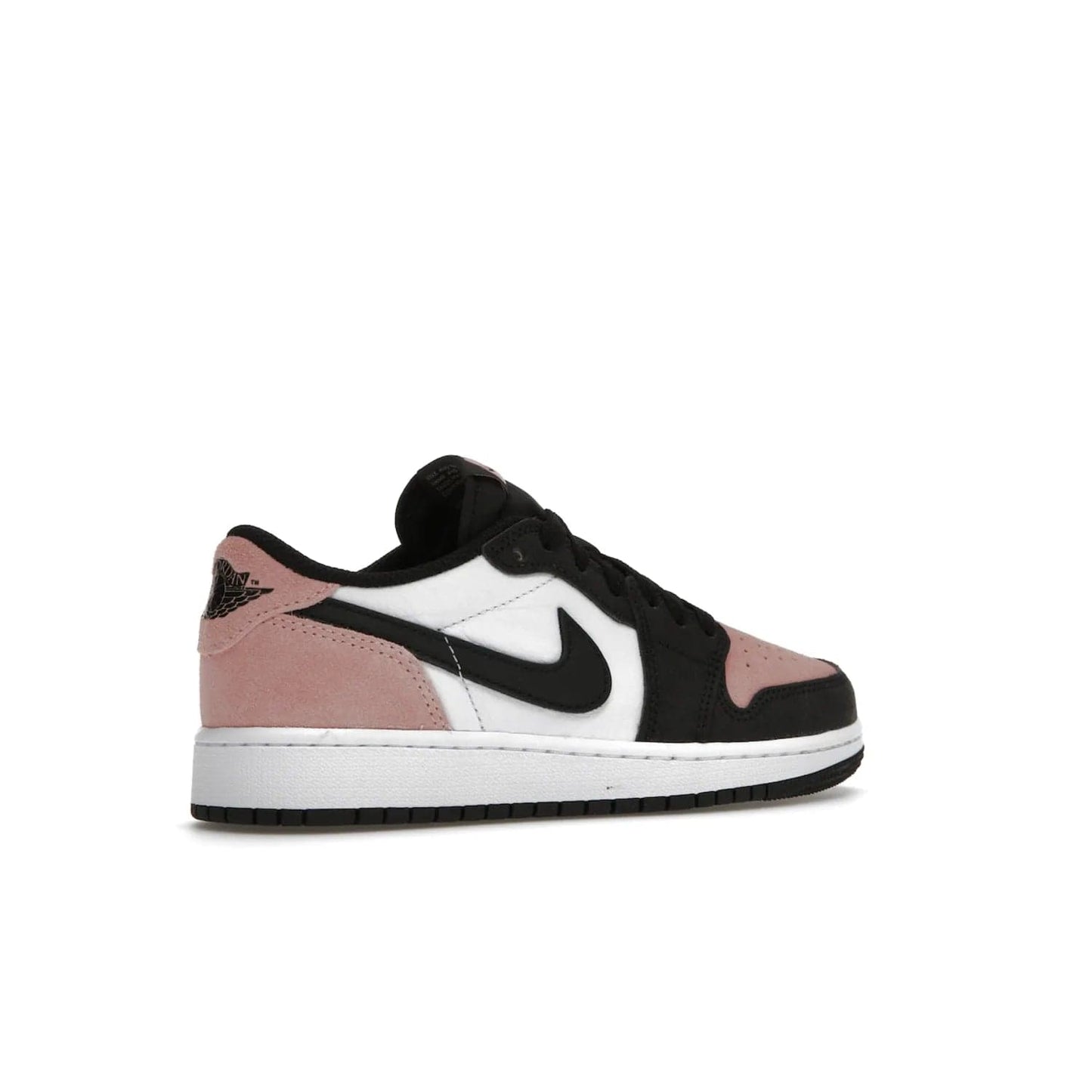 Jordan 1 Low OG Bleached Coral (GS) - Image 34 - Only at www.BallersClubKickz.com - Look cool and classic in the Air Jordan 1 Low OG Bleached Coral (Gradeschool). White leather upper with bleached coral accents, black toe and Swooshes, and perforated toe box for breathability. Style with jeans or shorts for an effortless look. Released July 2022.
