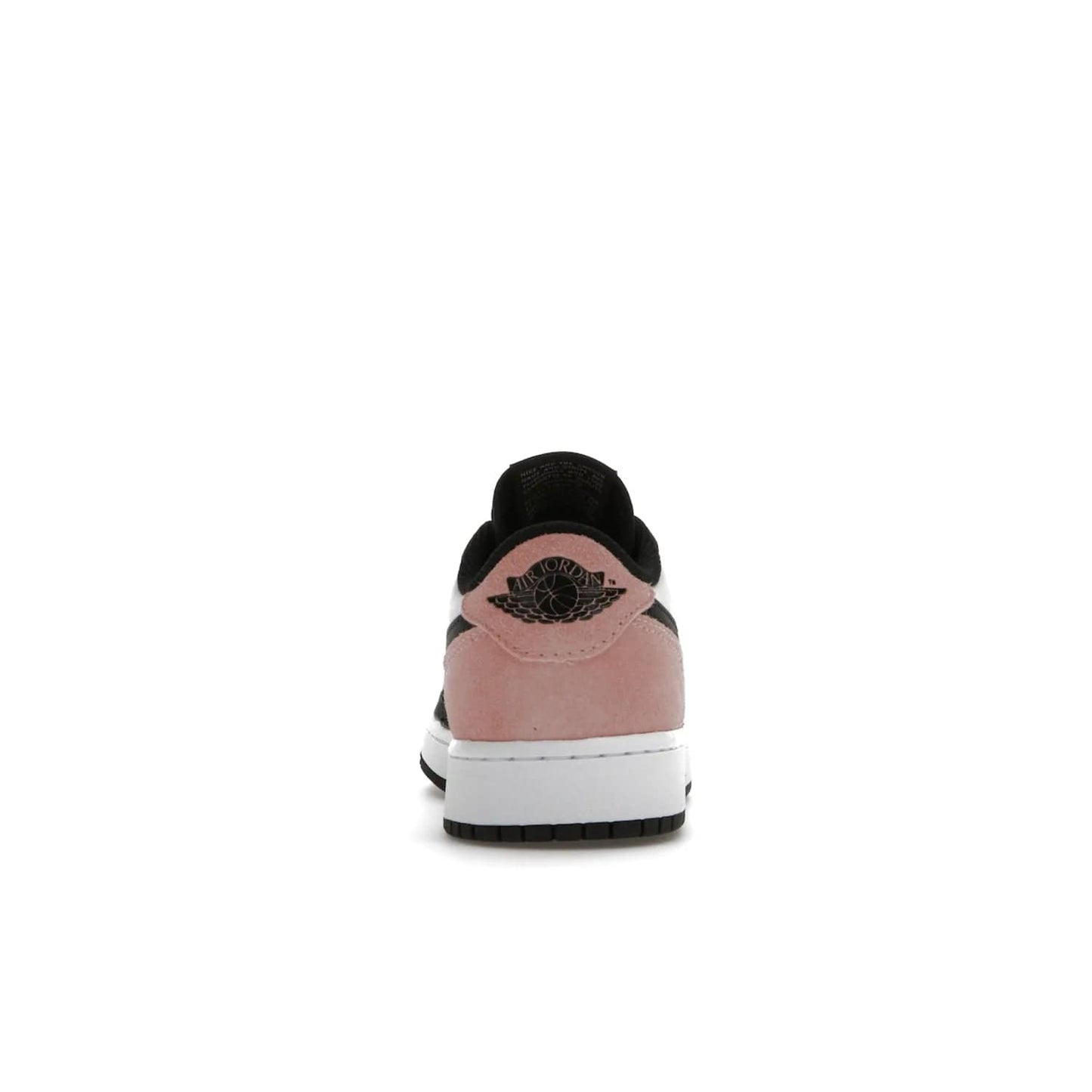 Jordan 1 Low OG Bleached Coral (GS) - Image 28 - Only at www.BallersClubKickz.com - Look cool and classic in the Air Jordan 1 Low OG Bleached Coral (Gradeschool). White leather upper with bleached coral accents, black toe and Swooshes, and perforated toe box for breathability. Style with jeans or shorts for an effortless look. Released July 2022.