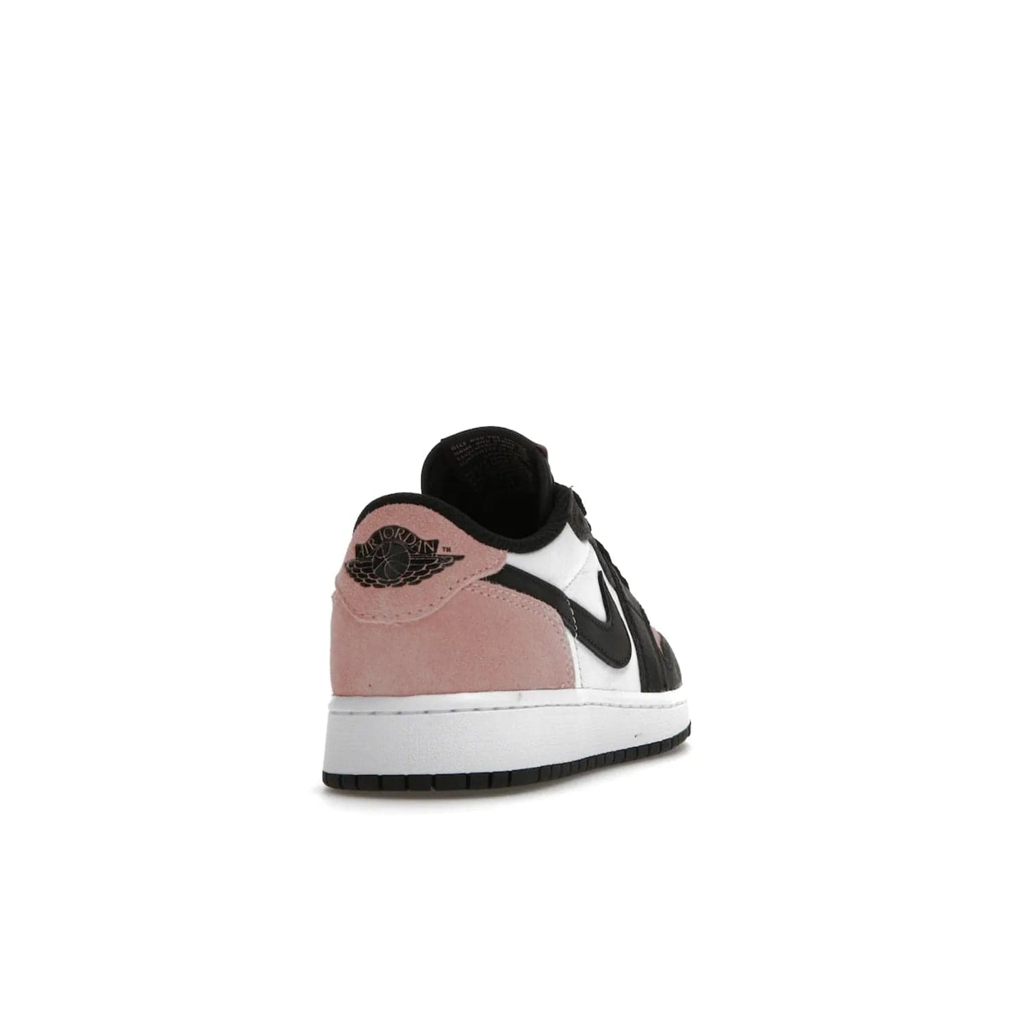 Jordan 1 Low OG Bleached Coral (GS) - Image 30 - Only at www.BallersClubKickz.com - Look cool and classic in the Air Jordan 1 Low OG Bleached Coral (Gradeschool). White leather upper with bleached coral accents, black toe and Swooshes, and perforated toe box for breathability. Style with jeans or shorts for an effortless look. Released July 2022.