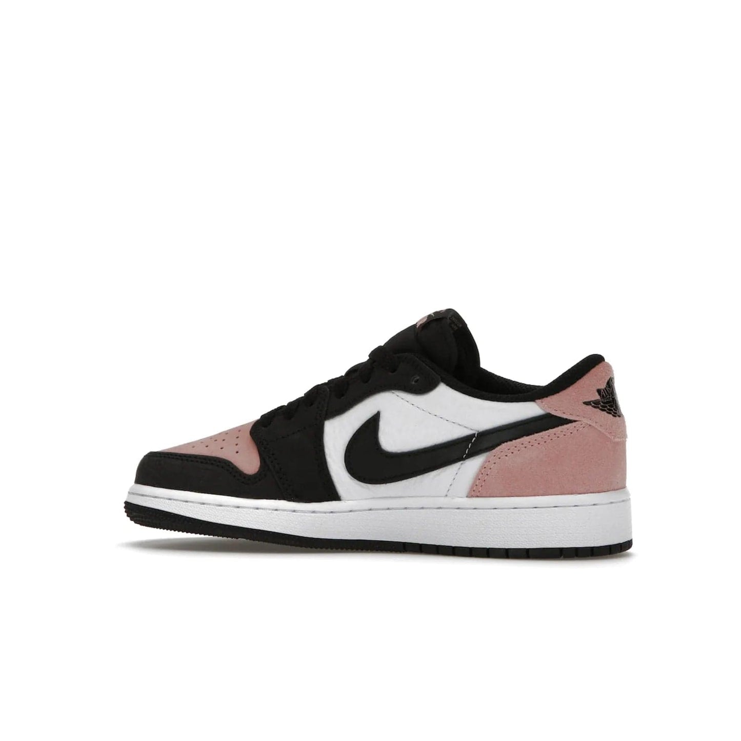 Jordan 1 Low OG Bleached Coral (GS) - Image 21 - Only at www.BallersClubKickz.com - Look cool and classic in the Air Jordan 1 Low OG Bleached Coral (Gradeschool). White leather upper with bleached coral accents, black toe and Swooshes, and perforated toe box for breathability. Style with jeans or shorts for an effortless look. Released July 2022.