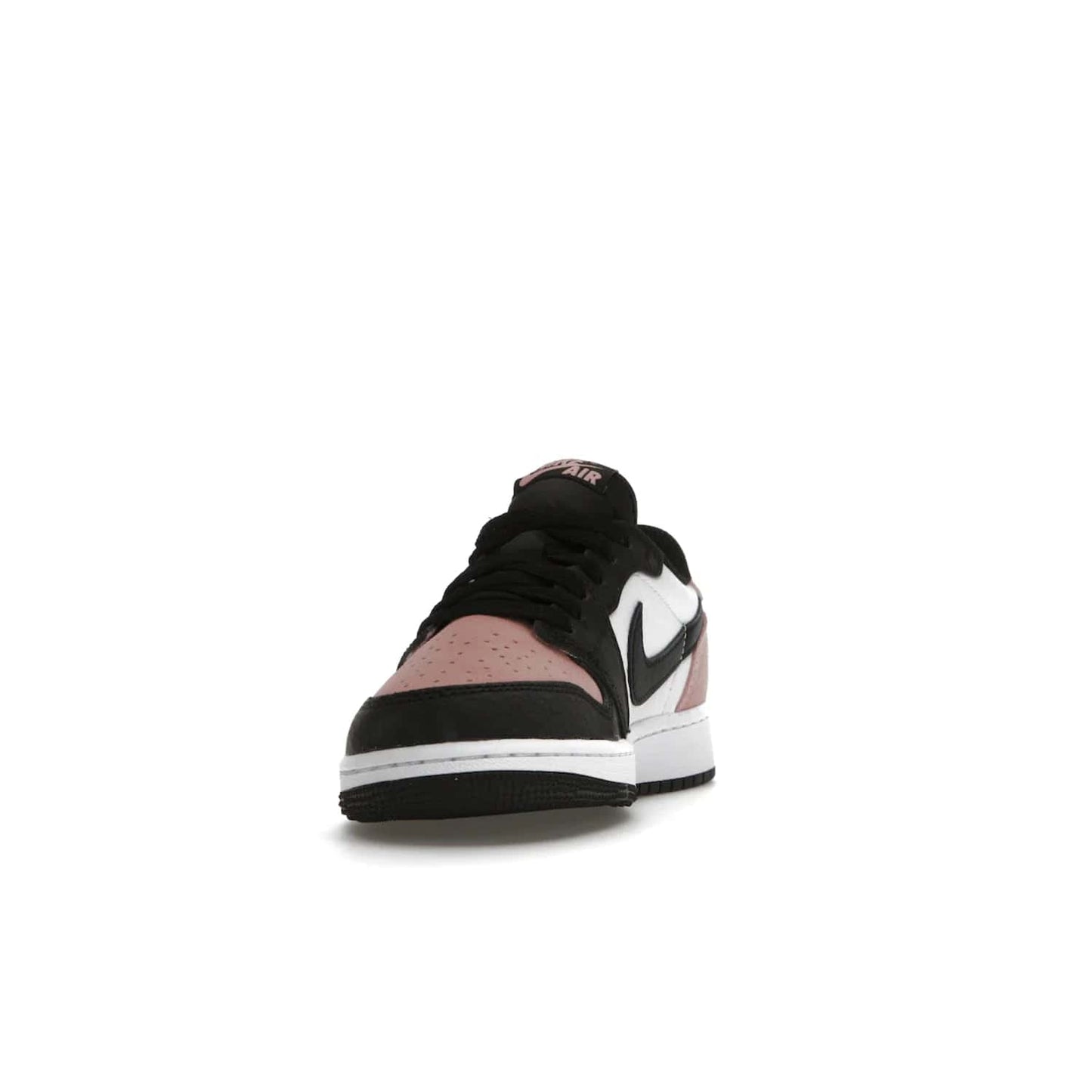 Jordan 1 Low OG Bleached Coral (GS) - Image 12 - Only at www.BallersClubKickz.com - Look cool and classic in the Air Jordan 1 Low OG Bleached Coral (Gradeschool). White leather upper with bleached coral accents, black toe and Swooshes, and perforated toe box for breathability. Style with jeans or shorts for an effortless look. Released July 2022.