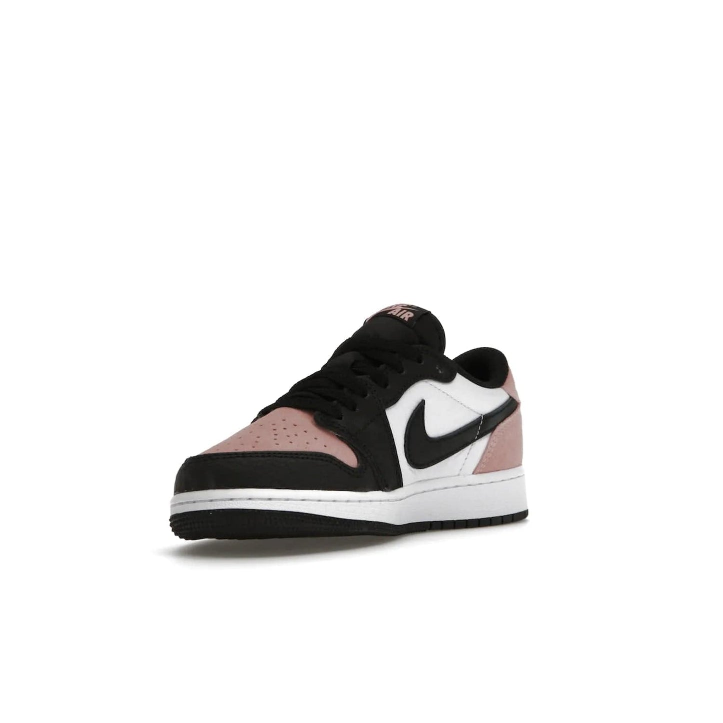 Jordan 1 Low OG Bleached Coral (GS) - Image 14 - Only at www.BallersClubKickz.com - Look cool and classic in the Air Jordan 1 Low OG Bleached Coral (Gradeschool). White leather upper with bleached coral accents, black toe and Swooshes, and perforated toe box for breathability. Style with jeans or shorts for an effortless look. Released July 2022.