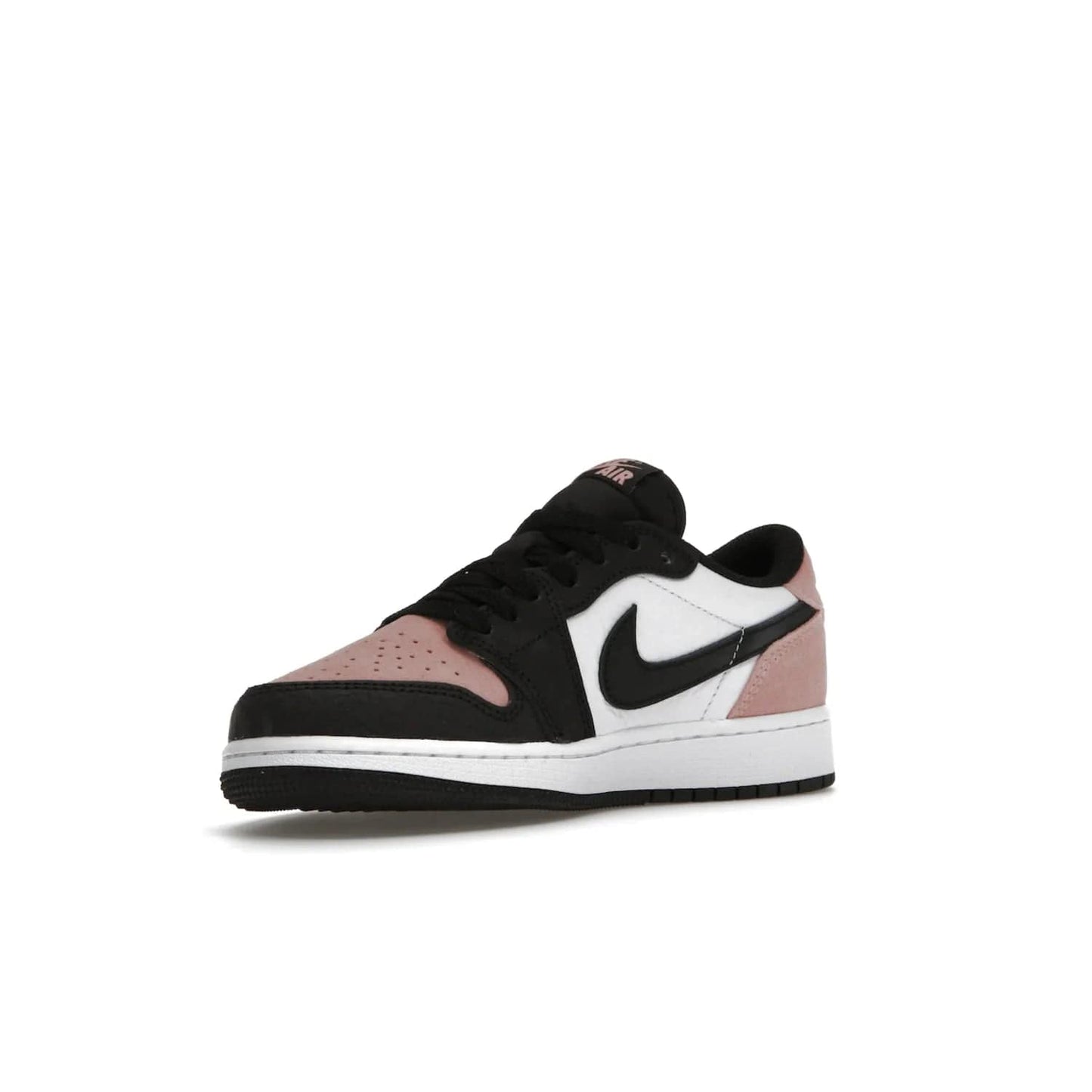 Jordan 1 Low OG Bleached Coral (GS) - Image 15 - Only at www.BallersClubKickz.com - Look cool and classic in the Air Jordan 1 Low OG Bleached Coral (Gradeschool). White leather upper with bleached coral accents, black toe and Swooshes, and perforated toe box for breathability. Style with jeans or shorts for an effortless look. Released July 2022.