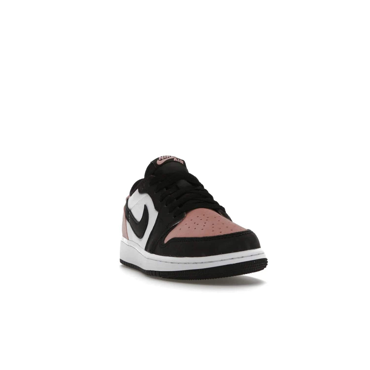 Jordan 1 Low OG Bleached Coral (GS) - Image 8 - Only at www.BallersClubKickz.com - Look cool and classic in the Air Jordan 1 Low OG Bleached Coral (Gradeschool). White leather upper with bleached coral accents, black toe and Swooshes, and perforated toe box for breathability. Style with jeans or shorts for an effortless look. Released July 2022.