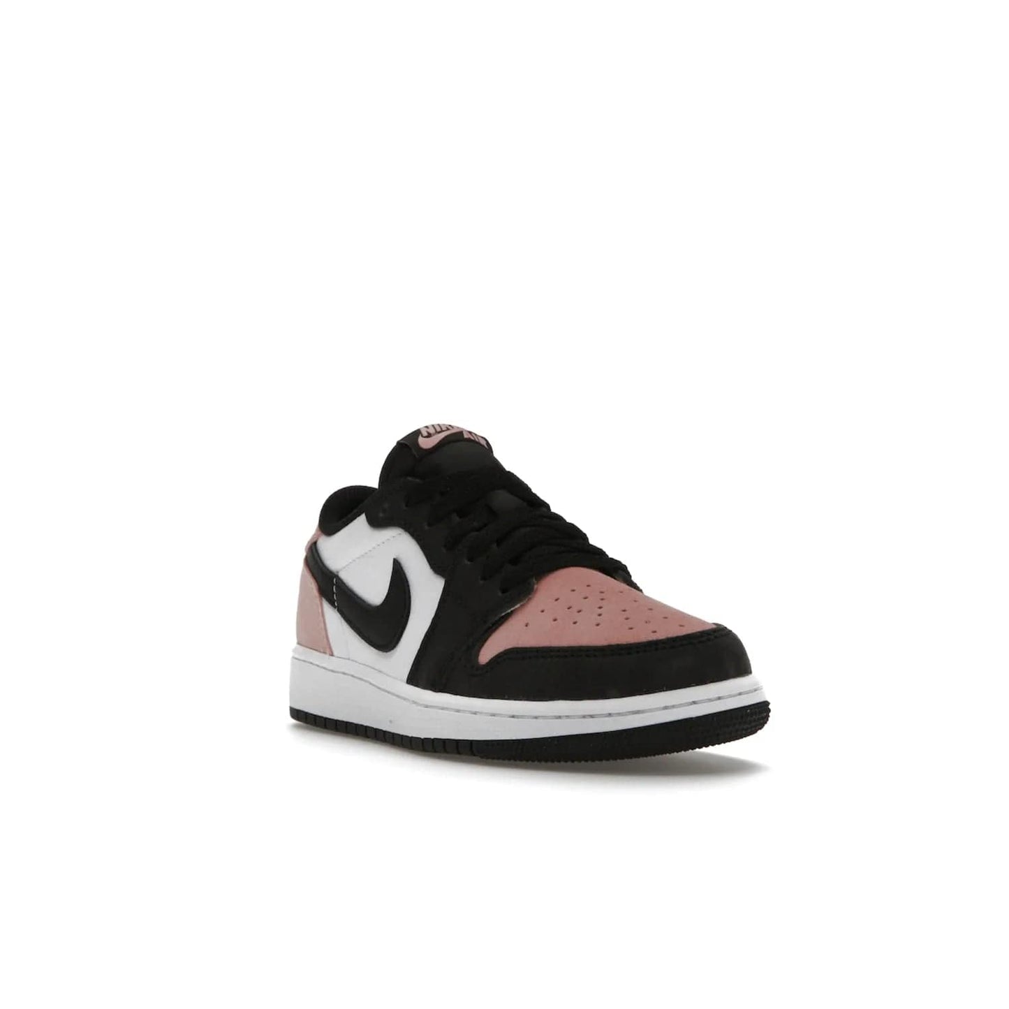 Jordan 1 Low OG Bleached Coral (GS) - Image 7 - Only at www.BallersClubKickz.com - Look cool and classic in the Air Jordan 1 Low OG Bleached Coral (Gradeschool). White leather upper with bleached coral accents, black toe and Swooshes, and perforated toe box for breathability. Style with jeans or shorts for an effortless look. Released July 2022.