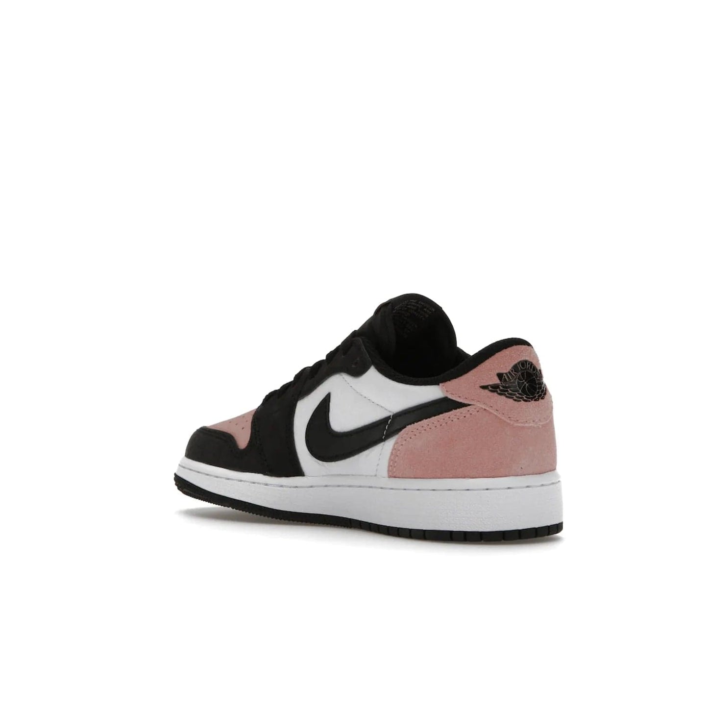 Jordan 1 Low OG Bleached Coral (GS) - Image 24 - Only at www.BallersClubKickz.com - Look cool and classic in the Air Jordan 1 Low OG Bleached Coral (Gradeschool). White leather upper with bleached coral accents, black toe and Swooshes, and perforated toe box for breathability. Style with jeans or shorts for an effortless look. Released July 2022.