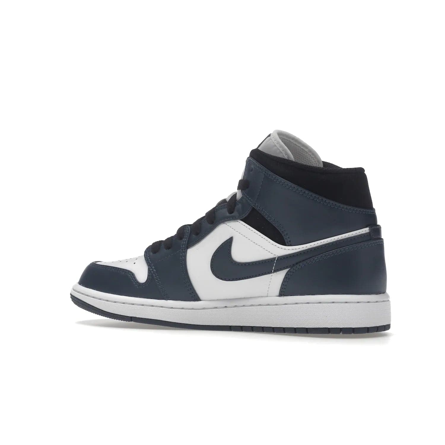 Jordan 1 Mid Armory Navy - Image 22 - Only at www.BallersClubKickz.com - The Jordan 1 Mid Armory Navy: classic basketball sneaker with soft white leather upper, deep navy blue overlays, and black leather ankle detailing. Iconic style with Jordan Wings logo and Jumpman label.
