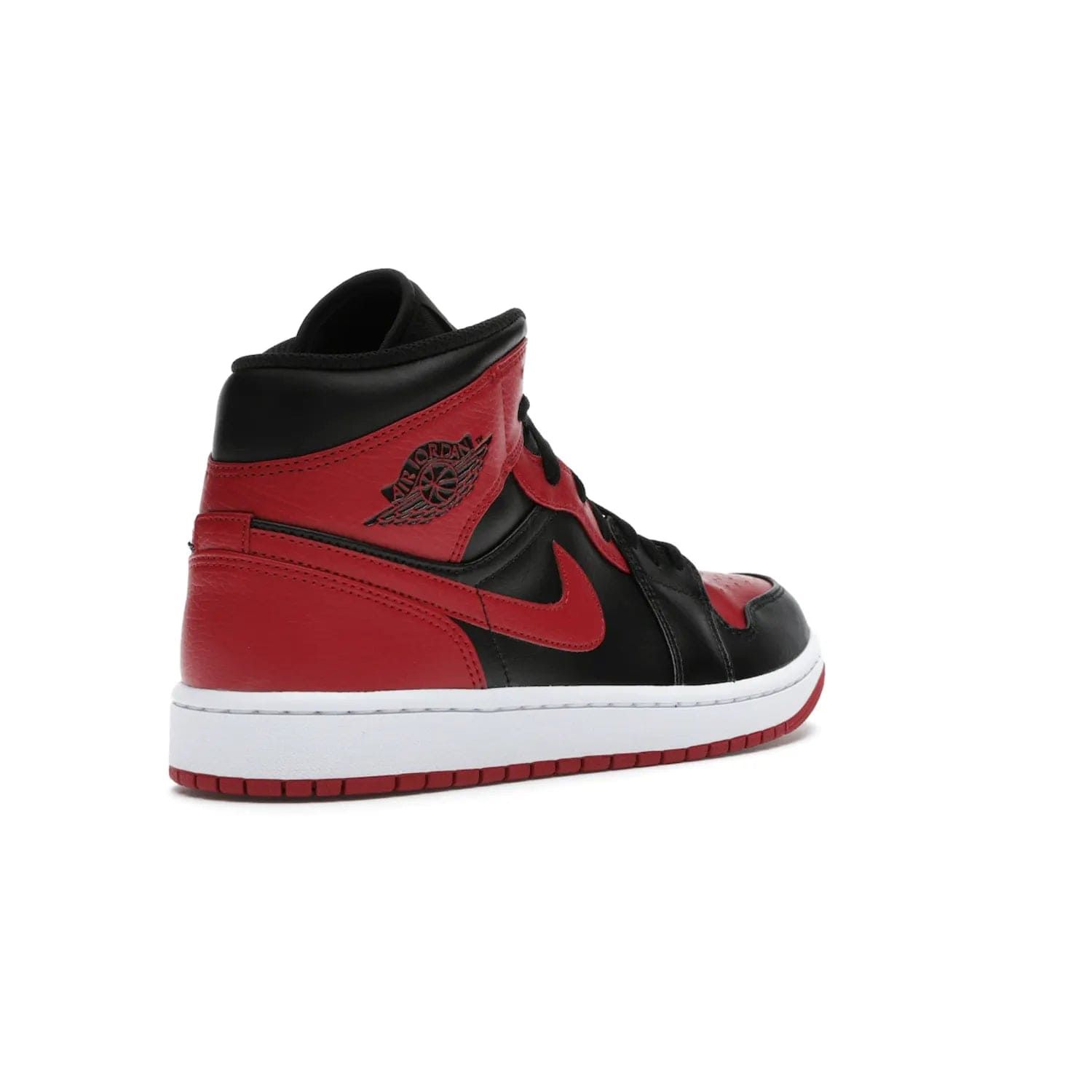 Jordan 1 Mid Banned (2020) - Image 32 - Only at www.BallersClubKickz.com - The Air Jordan 1 Mid Banned (2020) brings a modern twist to the classic Banned colorway. Features full-grain black and red leather uppers, red leather around the toe, collar, heel, & Swoosh. Release November 2021 for $110.