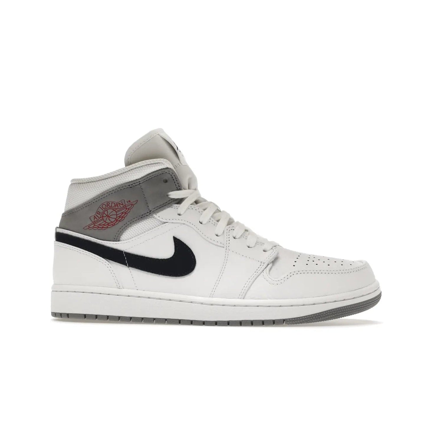 Jordan 1 Mid Paris White - Image 2 - Only at www.BallersClubKickz.com - Snag the Air Jordan 1 Mid Paris White to add a statement of sophistication to any sneaker collection. Featuring Nike swoosh logo in midnight navy suede and Jumpman symbol in University Red.