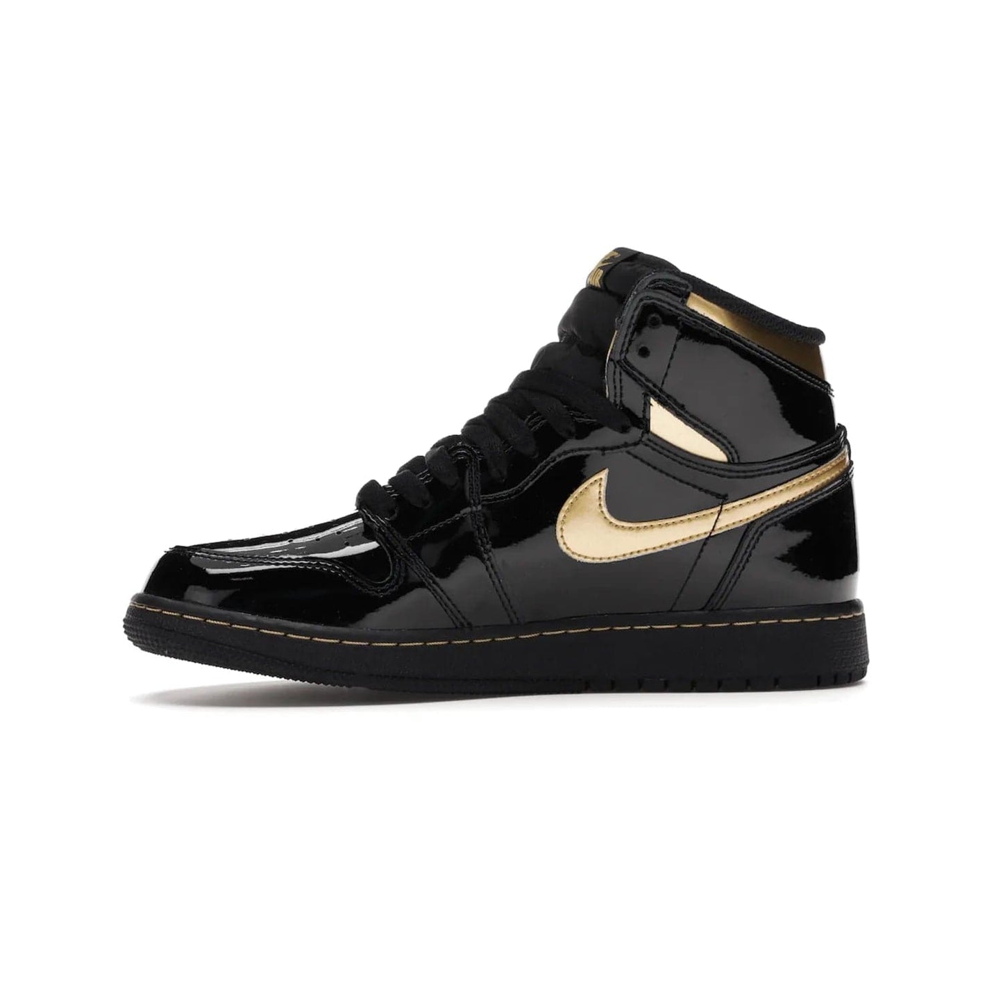 Jordan 1 Retro High Black Metallic Gold (2020) (GS) - Image 18 - Only at www.BallersClubKickz.com - Shop the Kids Air Jordan 1 Retro High in Black Metallic Gold for a stylish and comfortable sneaker kids can love. Featuring black and metallic gold patent leather uppers, metallic gold accents, and an Air sole unit for extra cushioning.
