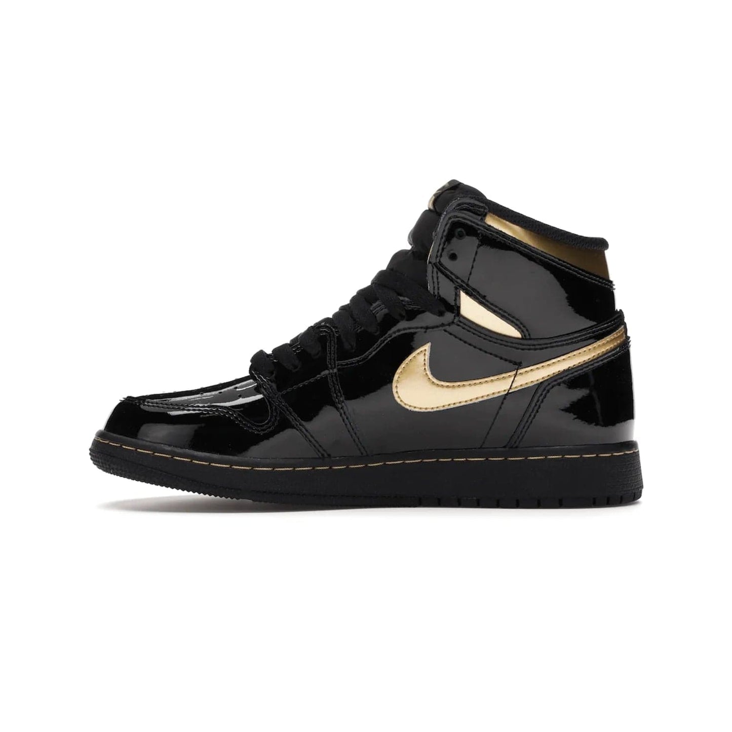 Jordan 1 Retro High Black Metallic Gold (2020) (GS) - Image 19 - Only at www.BallersClubKickz.com - Shop the Kids Air Jordan 1 Retro High in Black Metallic Gold for a stylish and comfortable sneaker kids can love. Featuring black and metallic gold patent leather uppers, metallic gold accents, and an Air sole unit for extra cushioning.
