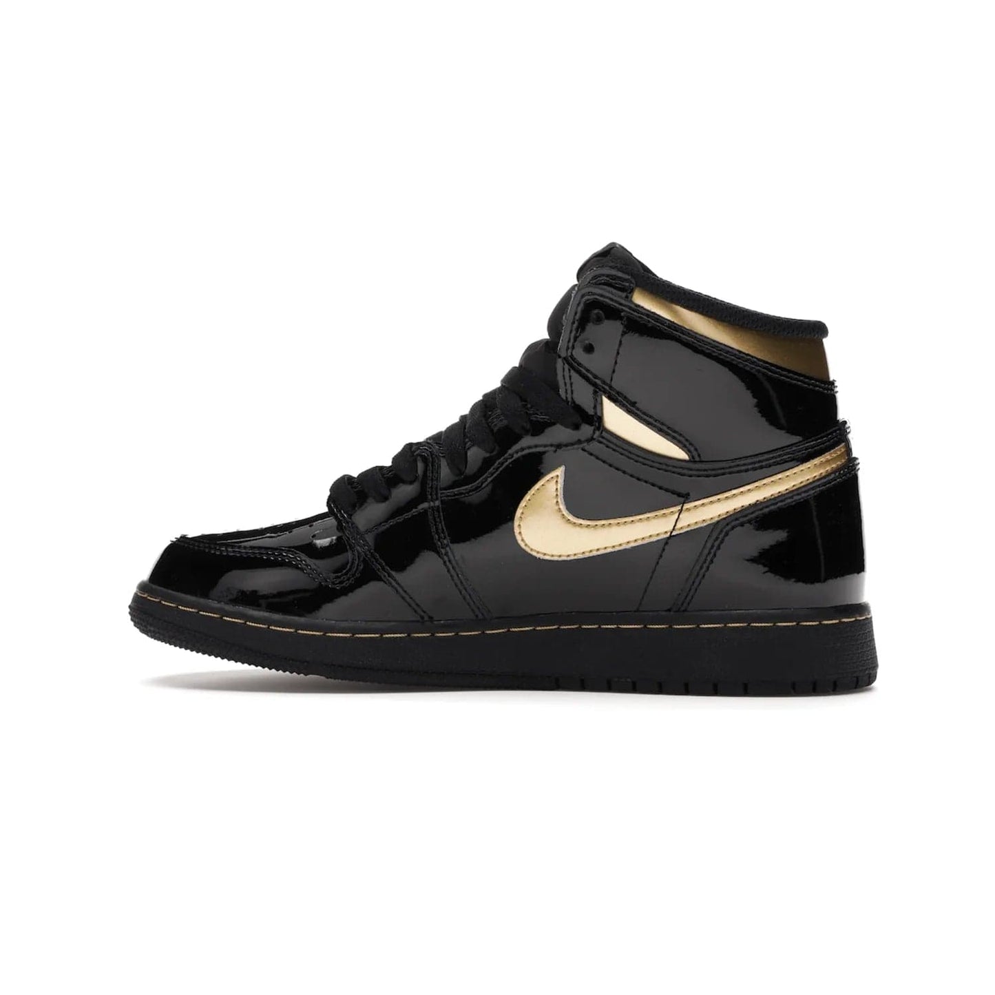 Jordan 1 Retro High Black Metallic Gold (2020) (GS) - Image 20 - Only at www.BallersClubKickz.com - Shop the Kids Air Jordan 1 Retro High in Black Metallic Gold for a stylish and comfortable sneaker kids can love. Featuring black and metallic gold patent leather uppers, metallic gold accents, and an Air sole unit for extra cushioning.