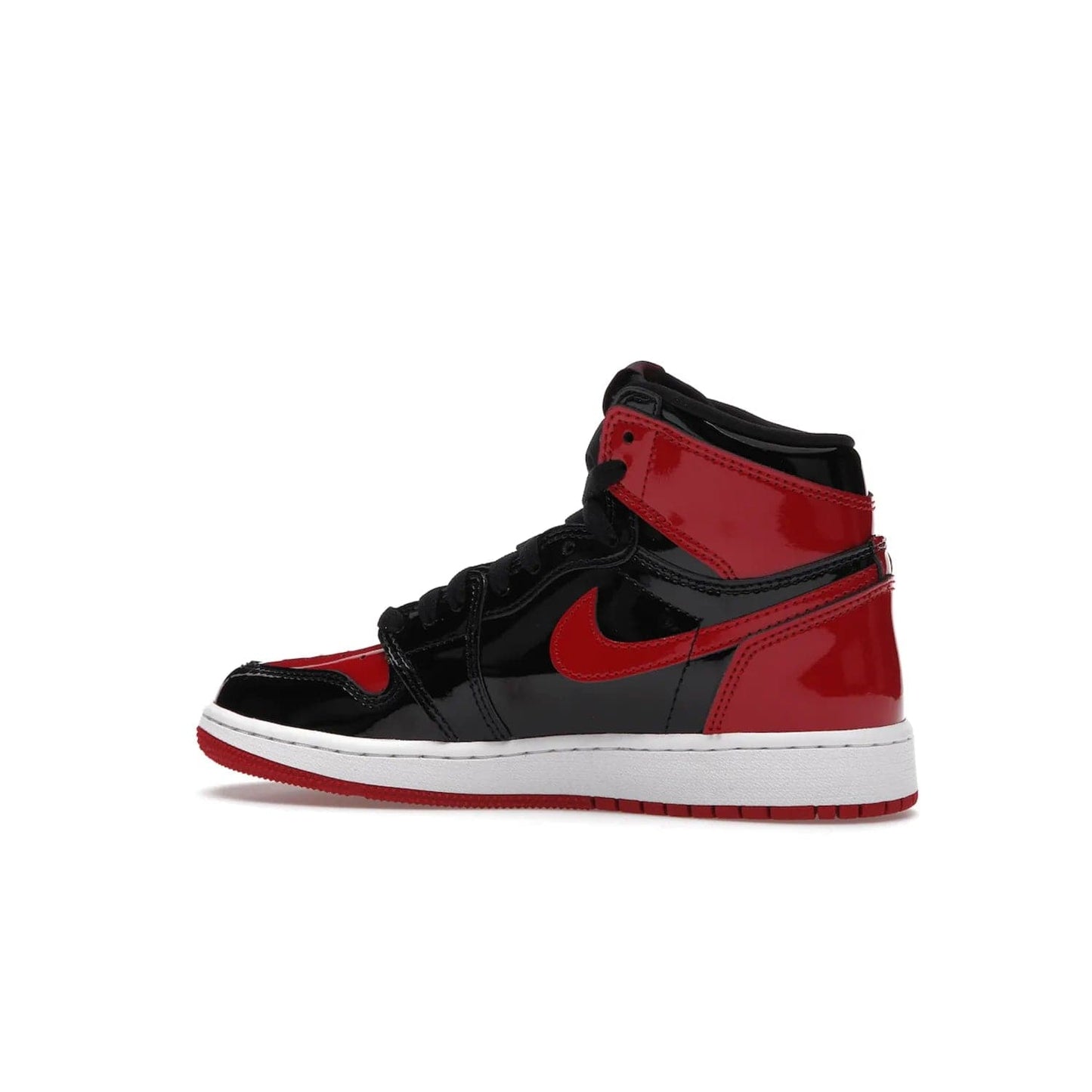 Jordan 1 Retro High OG Patent Bred (GS) - Image 21 - Only at www.BallersClubKickz.com - Upgrade your sneaker game with the iconic Air Jordan 1 Retro High OG Bred Patent GS. Crafted with premium patent leather and basketball-inspired details for a classic look, they also feature an encapsulated Air-sole cushioning and enhanced red rubber outsole. Don't miss this timeless sneaker with a striking black, white, and varsity red colorway, dropping December 2021.