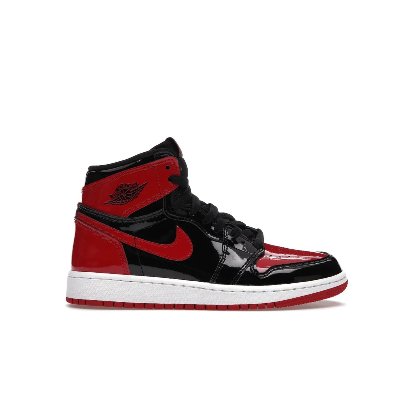 Jordan 1 Retro High OG Patent Bred (GS) - Image 1 - Only at www.BallersClubKickz.com - Upgrade your sneaker game with the iconic Air Jordan 1 Retro High OG Bred Patent GS. Crafted with premium patent leather and basketball-inspired details for a classic look, they also feature an encapsulated Air-sole cushioning and enhanced red rubber outsole. Don't miss this timeless sneaker with a striking black, white, and varsity red colorway, dropping December 2021.
