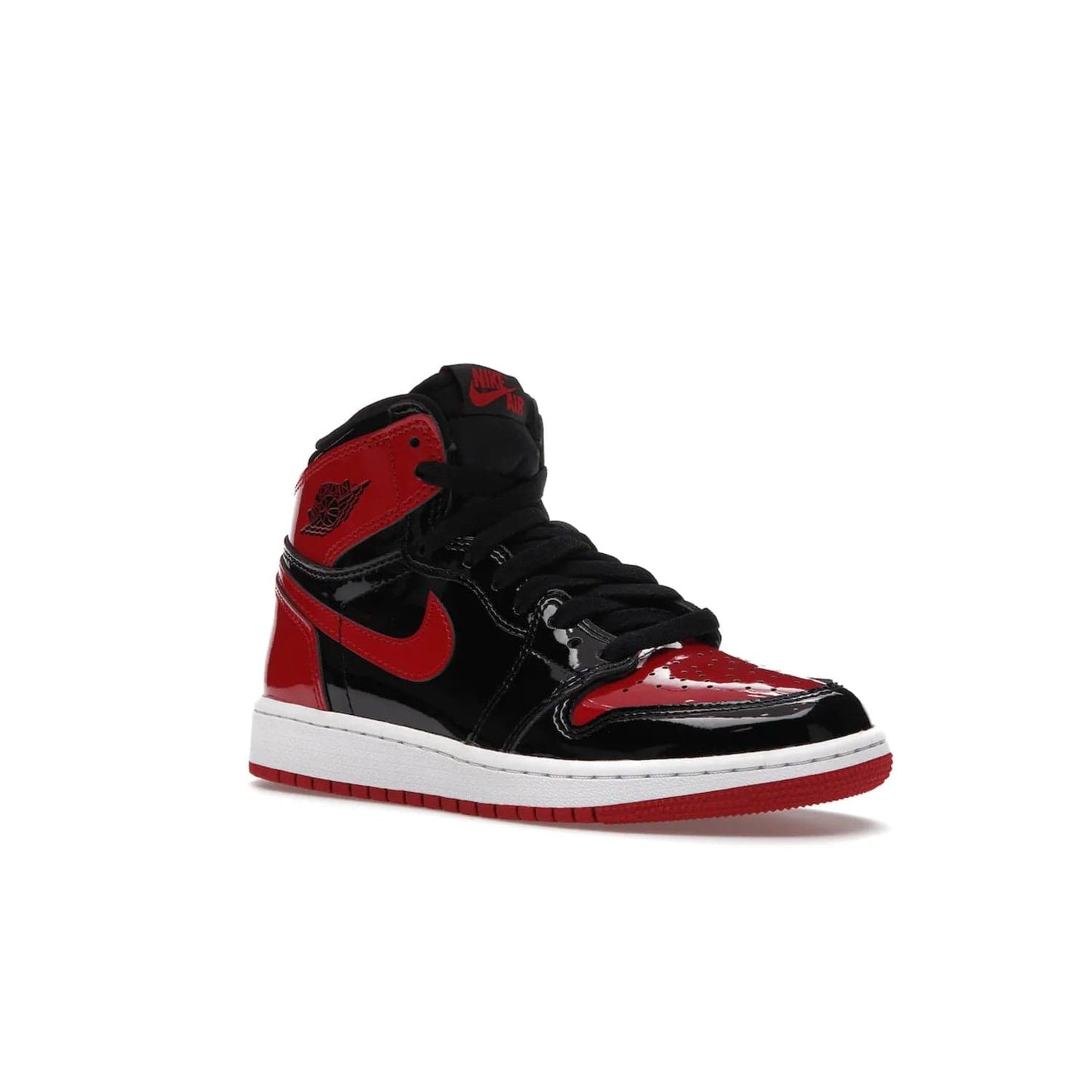 Jordan 1 Retro High OG Patent Bred (GS) - Image 5 - Only at www.BallersClubKickz.com - Upgrade your sneaker game with the iconic Air Jordan 1 Retro High OG Bred Patent GS. Crafted with premium patent leather and basketball-inspired details for a classic look, they also feature an encapsulated Air-sole cushioning and enhanced red rubber outsole. Don't miss this timeless sneaker with a striking black, white, and varsity red colorway, dropping December 2021.